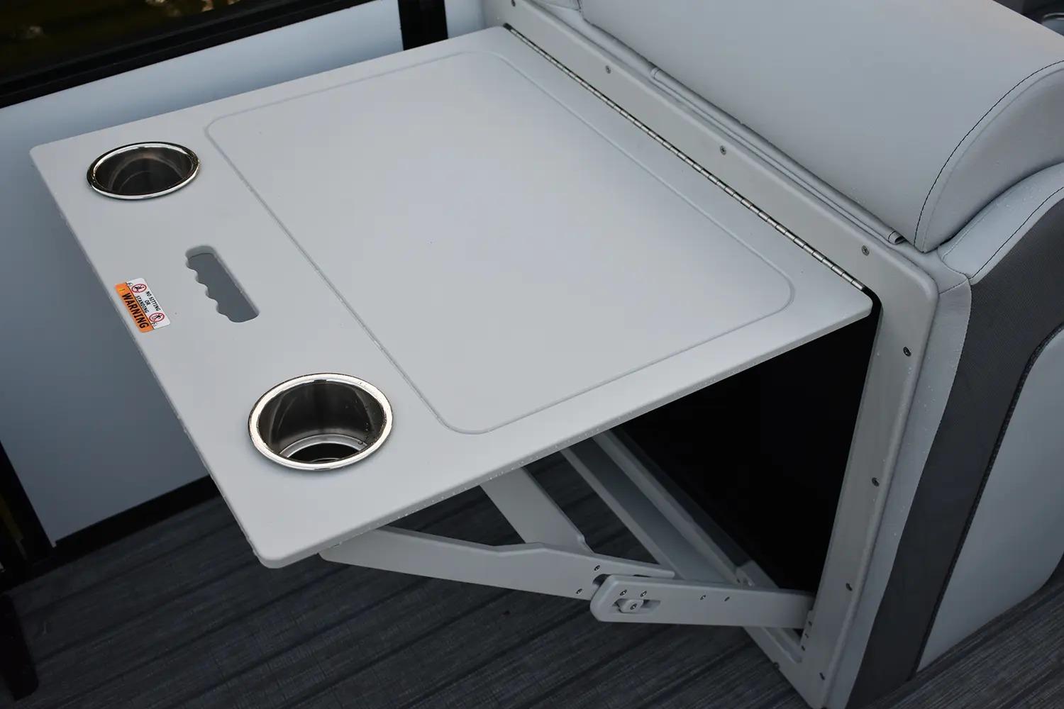 Foldable table with cup holders on 2025 Bentley Pontoons Elite 253 QSB.