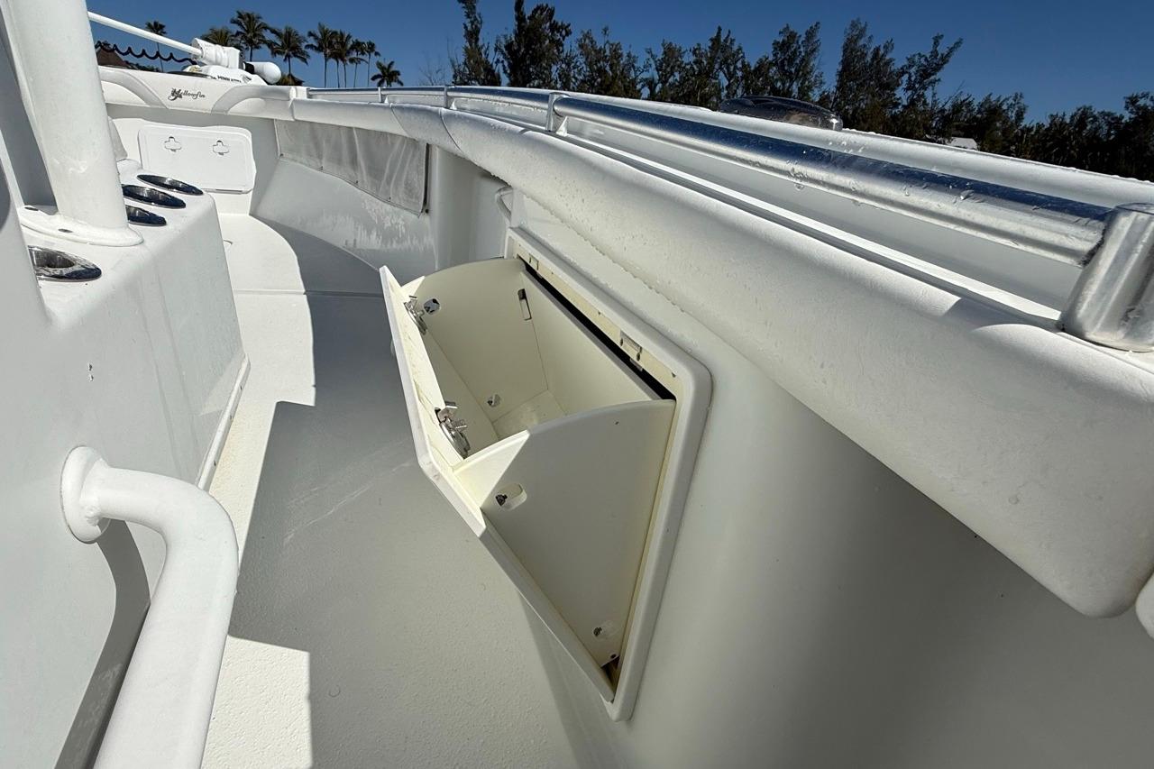 2017 Yellowfin 26 Hybrid boat interior with open storage compartment.