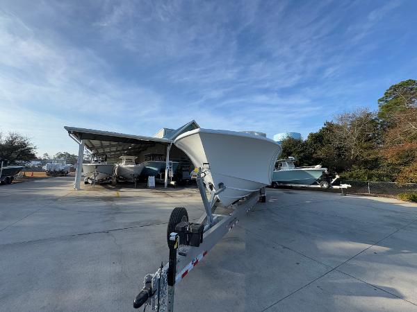 2025 Yellowfin 39 Offshore boat on trailer, parked outdoors under clear sky.