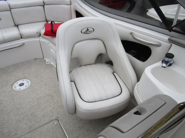 2004 Ebbtide 22 Mystique boat interior with plush seating and modern design.