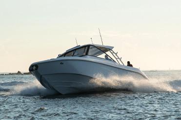 Manufacturer Provided Image: 2019 Everglades 340 Dual Console boat cruising on open water.