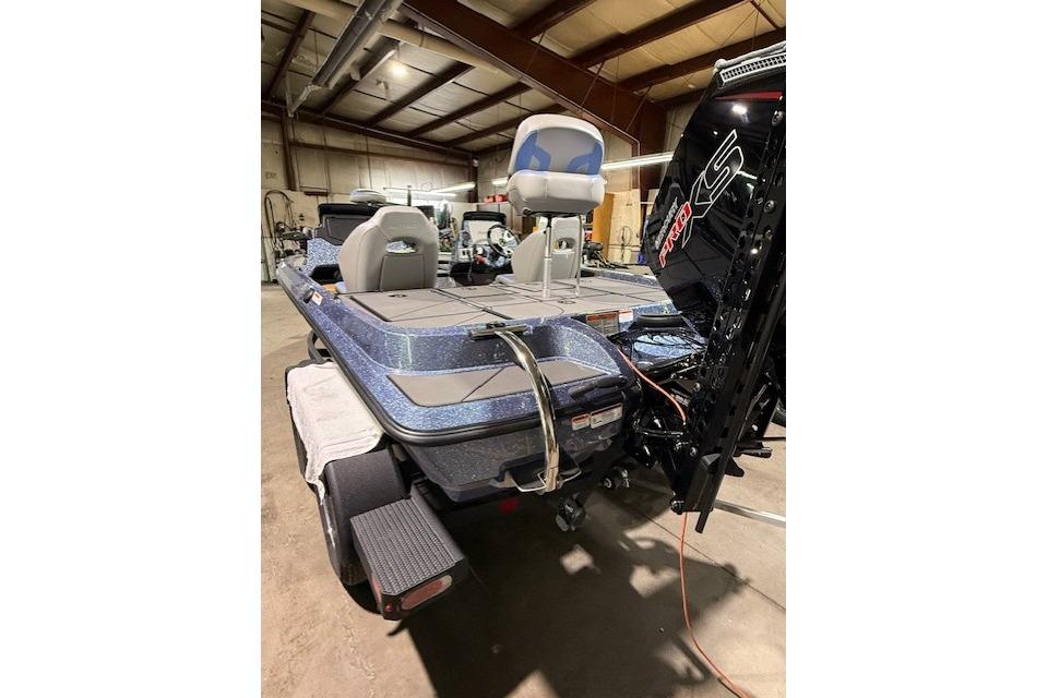 2026 Nitro Z19 XL Pro boat in a warehouse, showcasing sleek design and modern features.
