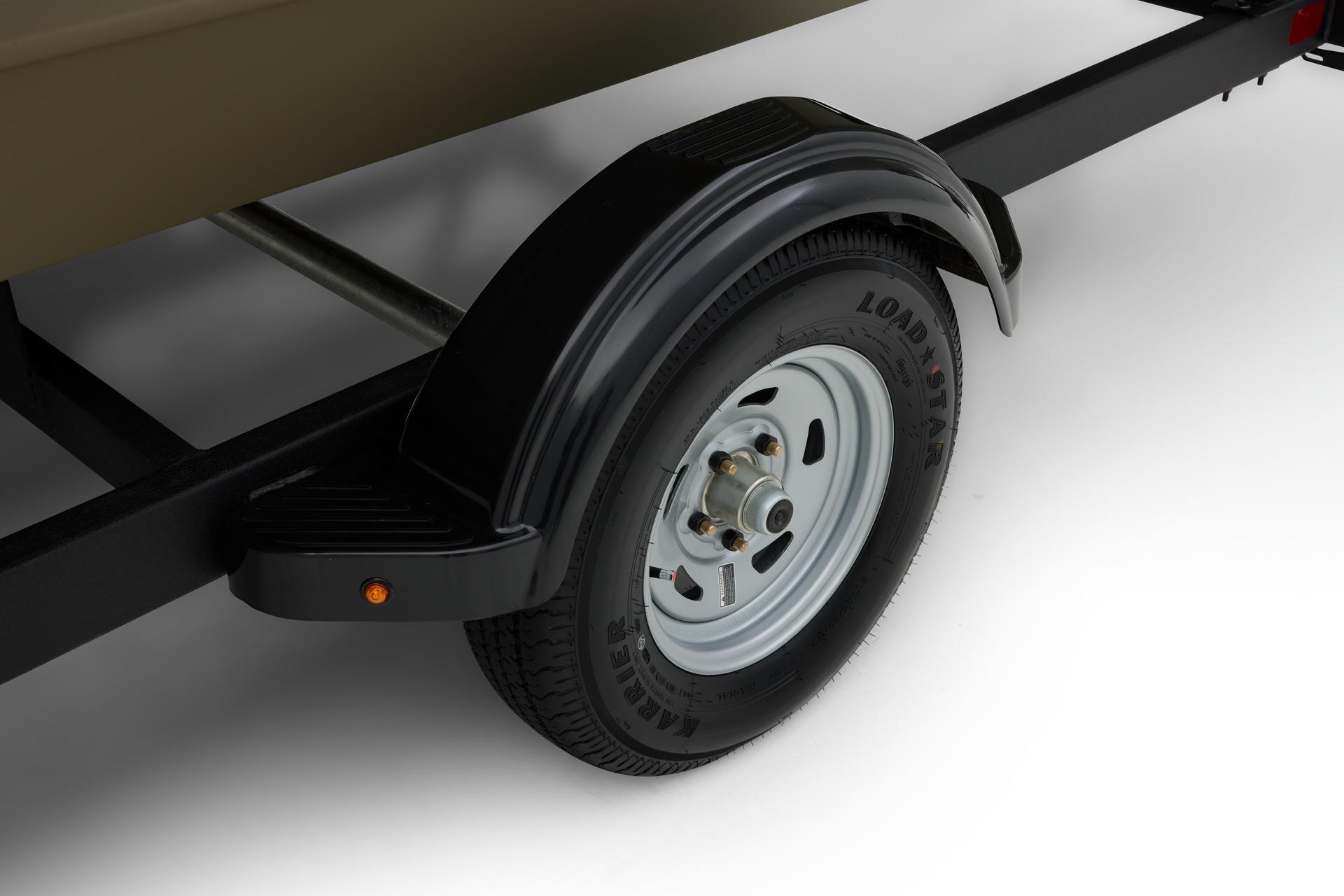 Trailer wheel of 2024 Tracker Grizzly 2072 CC boat, featuring Loadstar tire.