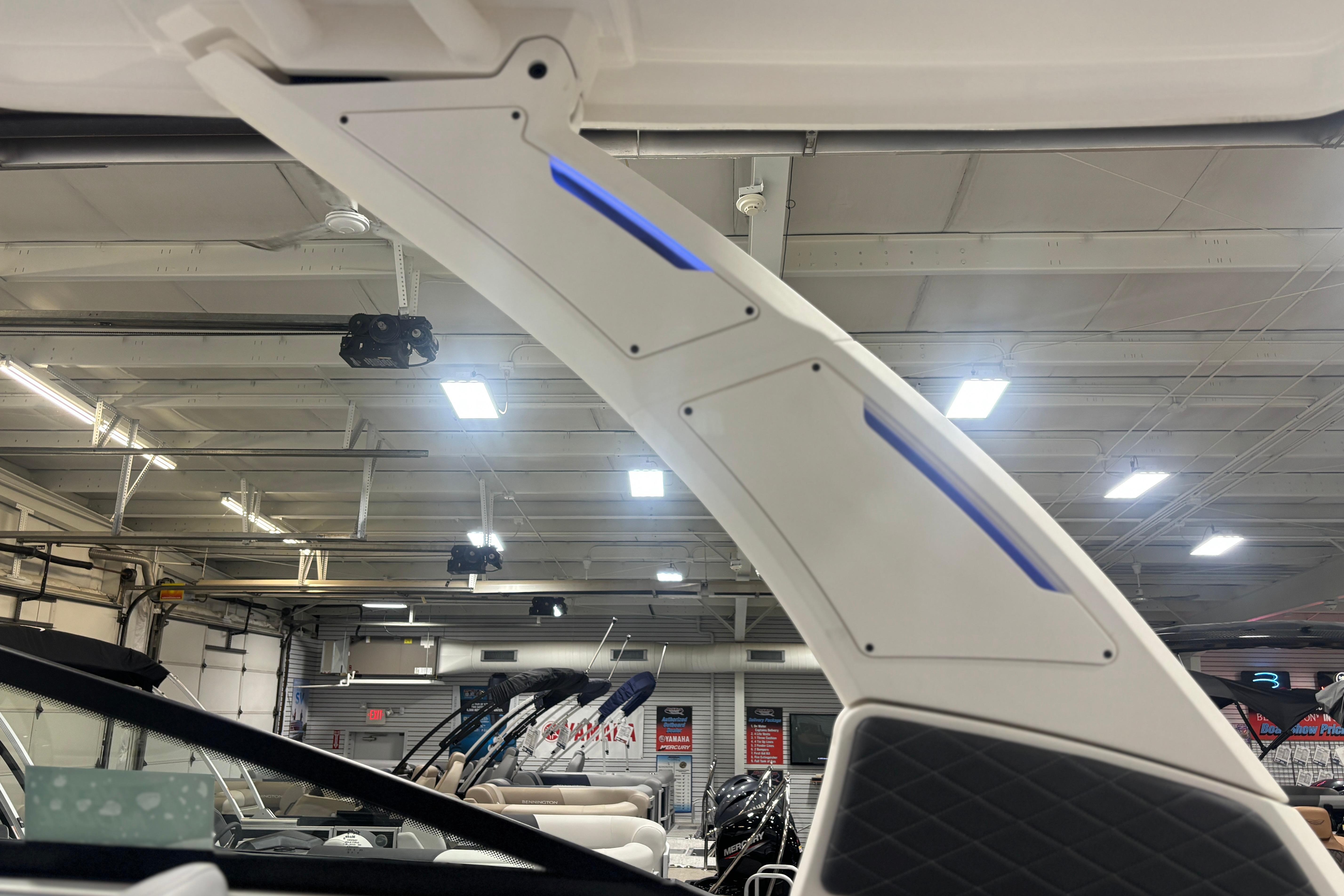 Interior view of 2026 Chaparral SSX 30 boat with modern design and blue LED lighting.