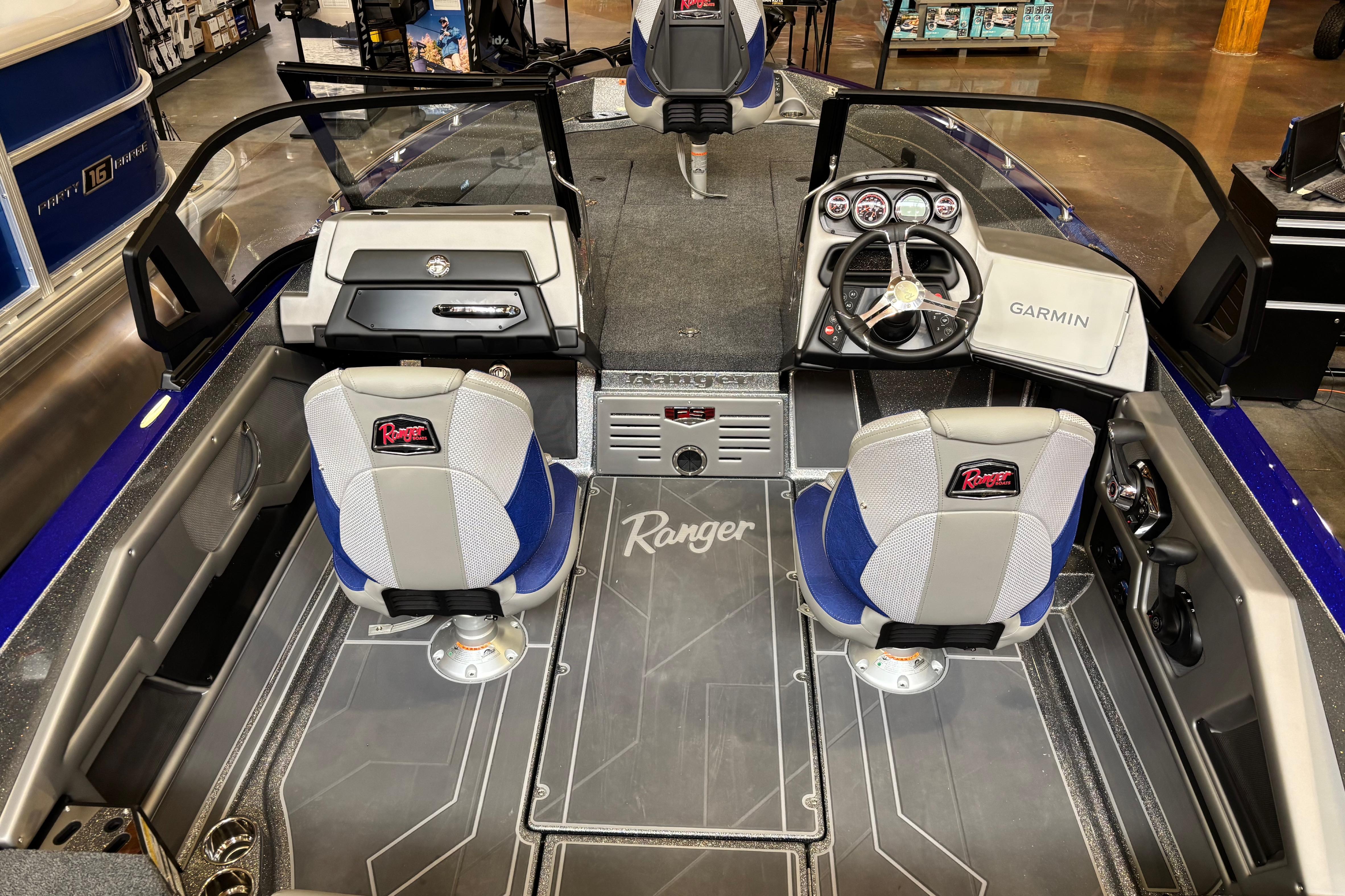 2026 Ranger 621FS Cup-Equipped boat interior with Garmin navigation system and dual seats.