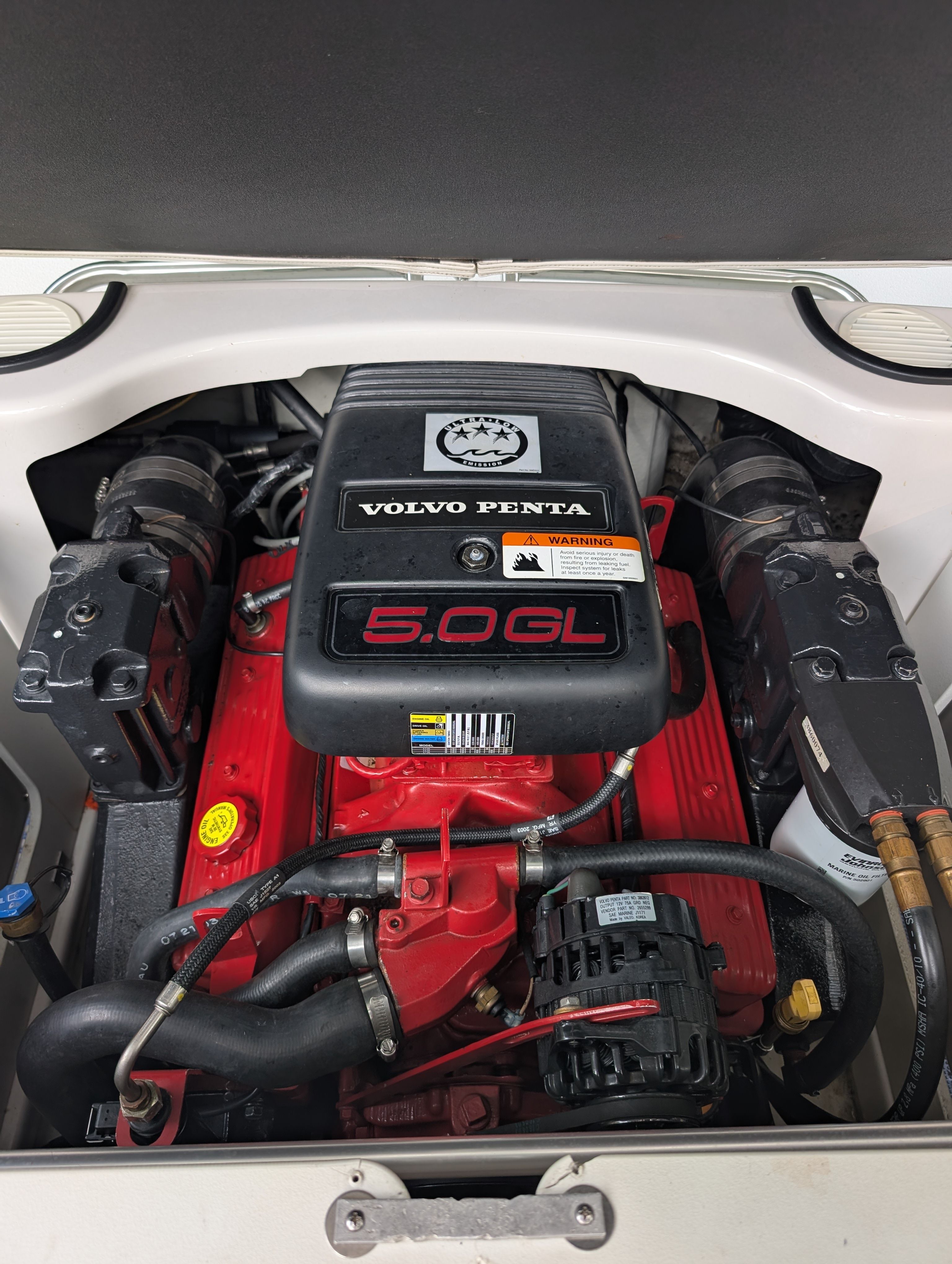 Engine compartment of a 2004 Four Winns 190 Horizon with a Volvo Penta 5.0 GL engine.