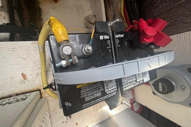 Marine battery installation on a 2004 Cruisers Yachts 3372 Express boat.