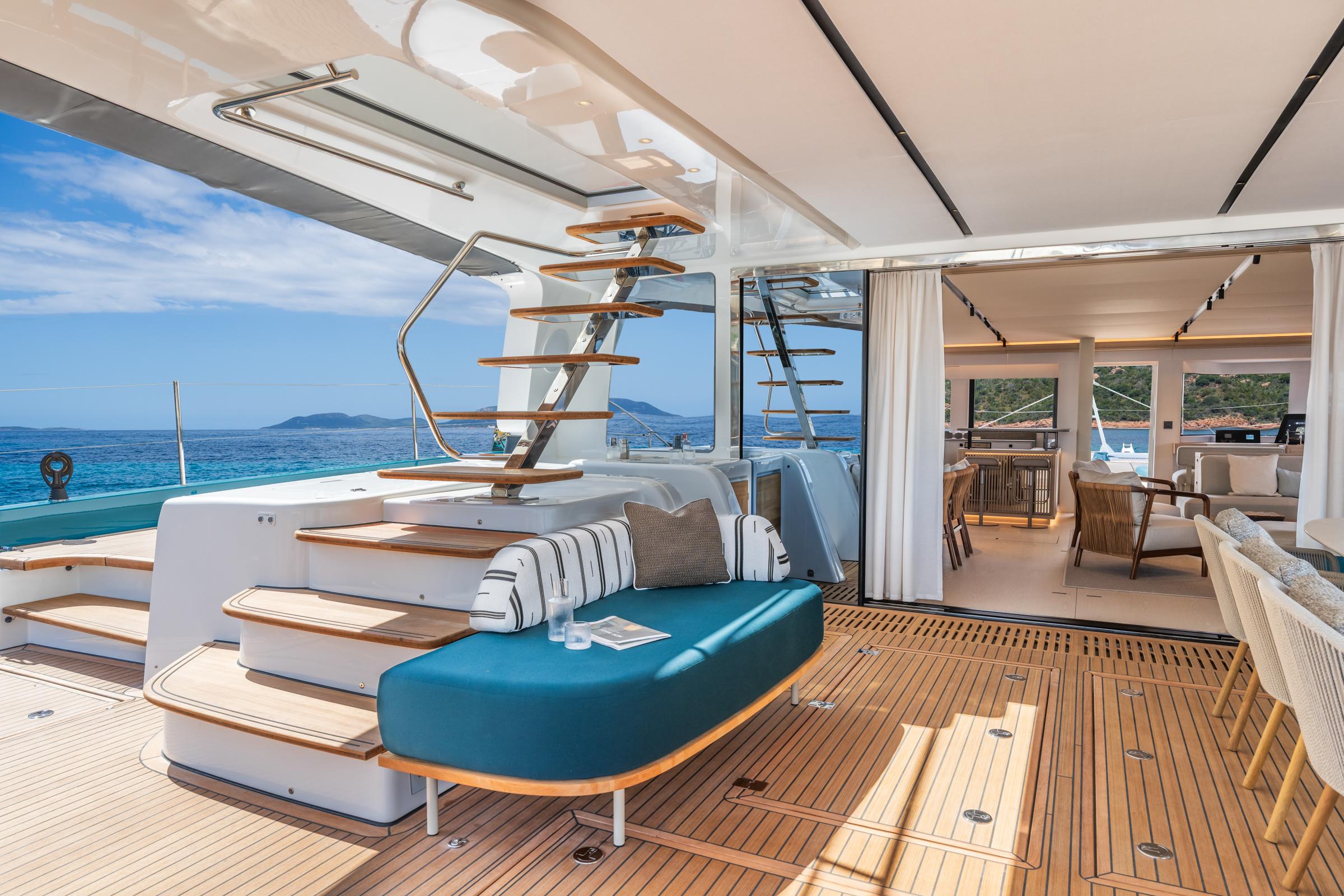 Luxurious Lagoon Eighty 2 yacht interior, 2025 model, featuring elegant seating and ocean views.