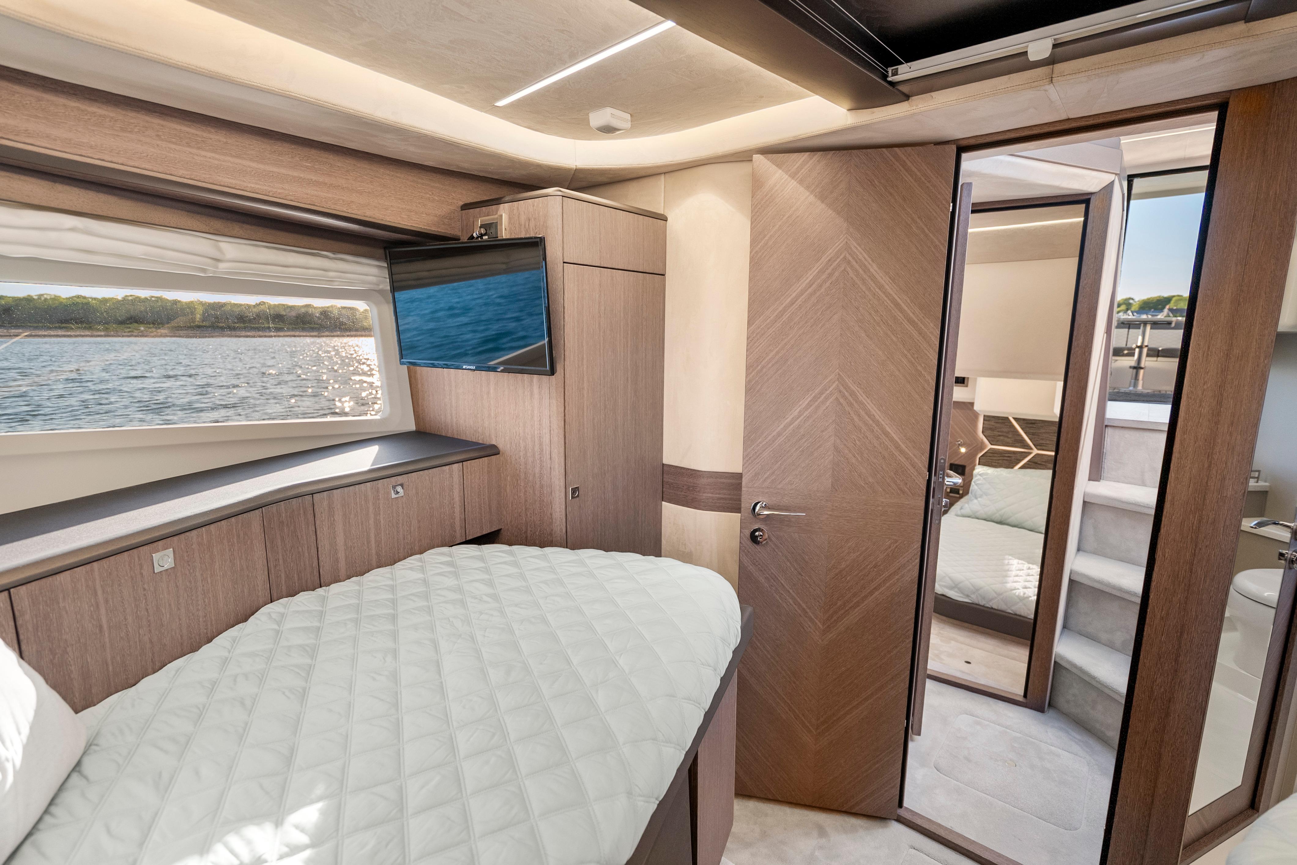 Luxurious interior of 2023 Galeon 400 Fly yacht with scenic water view.