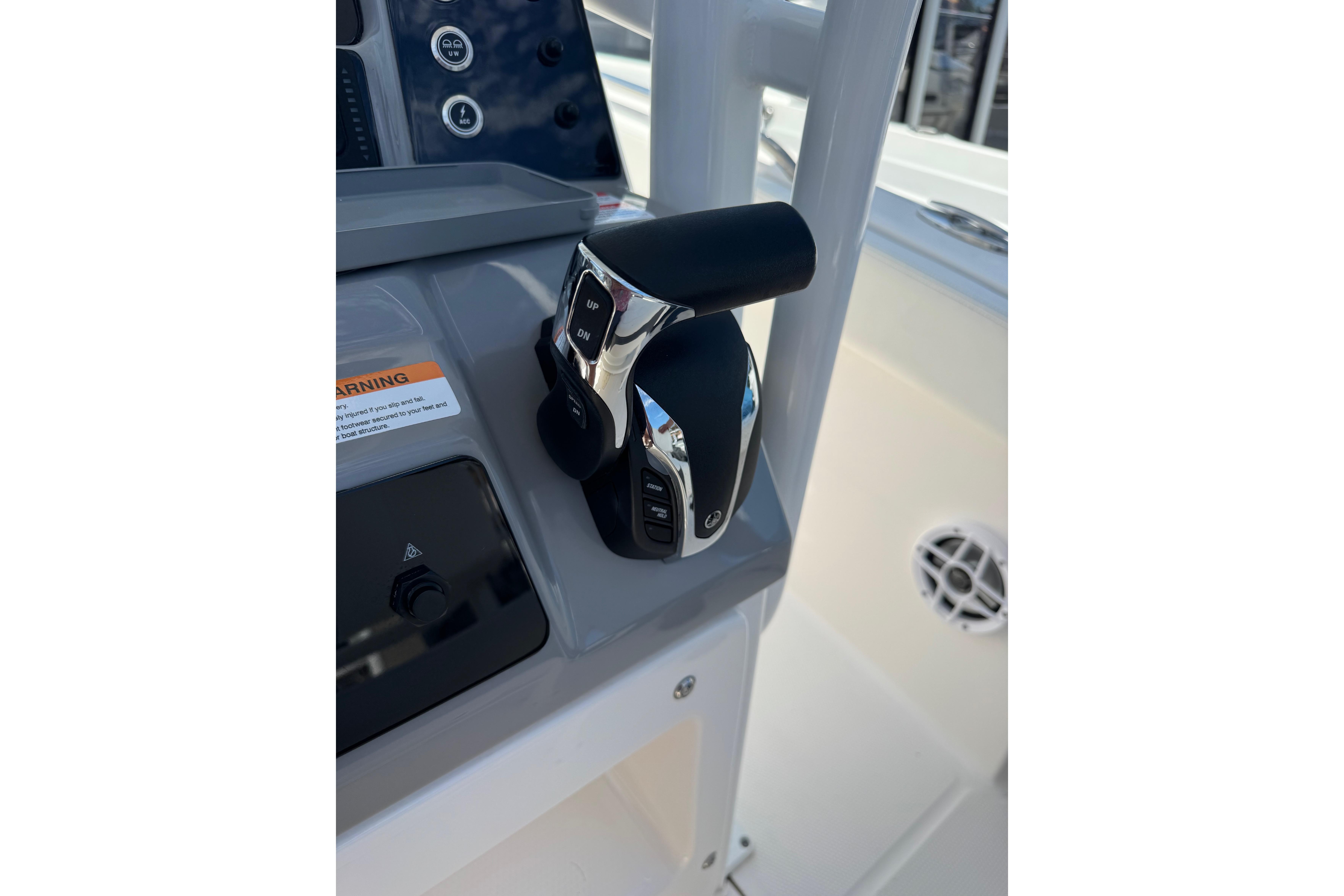 2022 Robalo R230 Center Console throttle controls on the dashboard.