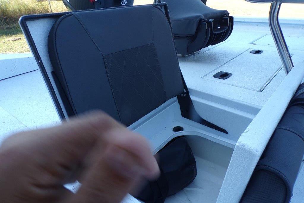 2026 Xpress H20B Bay boat seat with storage compartment, featuring sleek design and functionality.