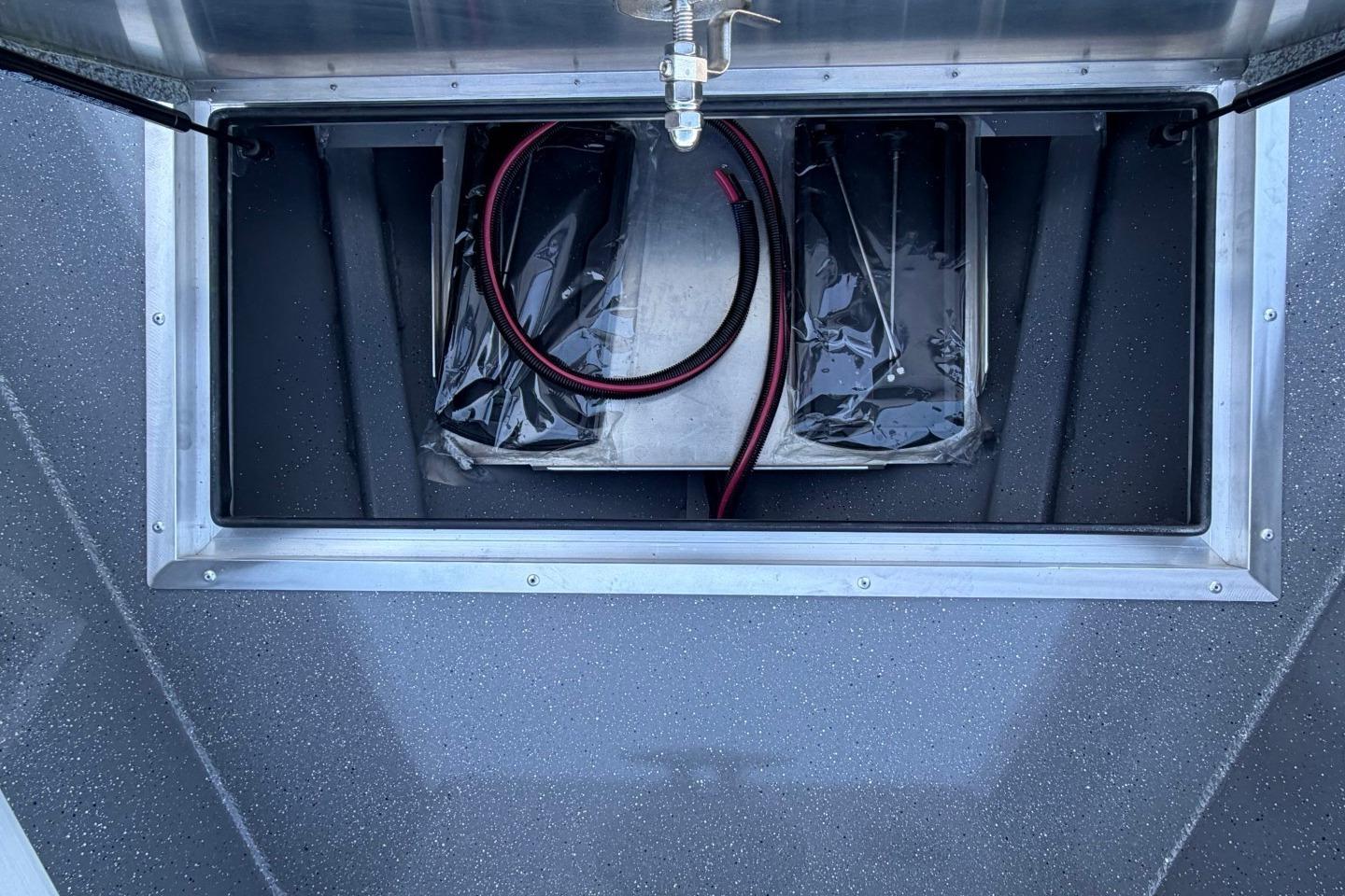 Open storage compartment in 2026 Thunder Jet 209 Rush OT boat.