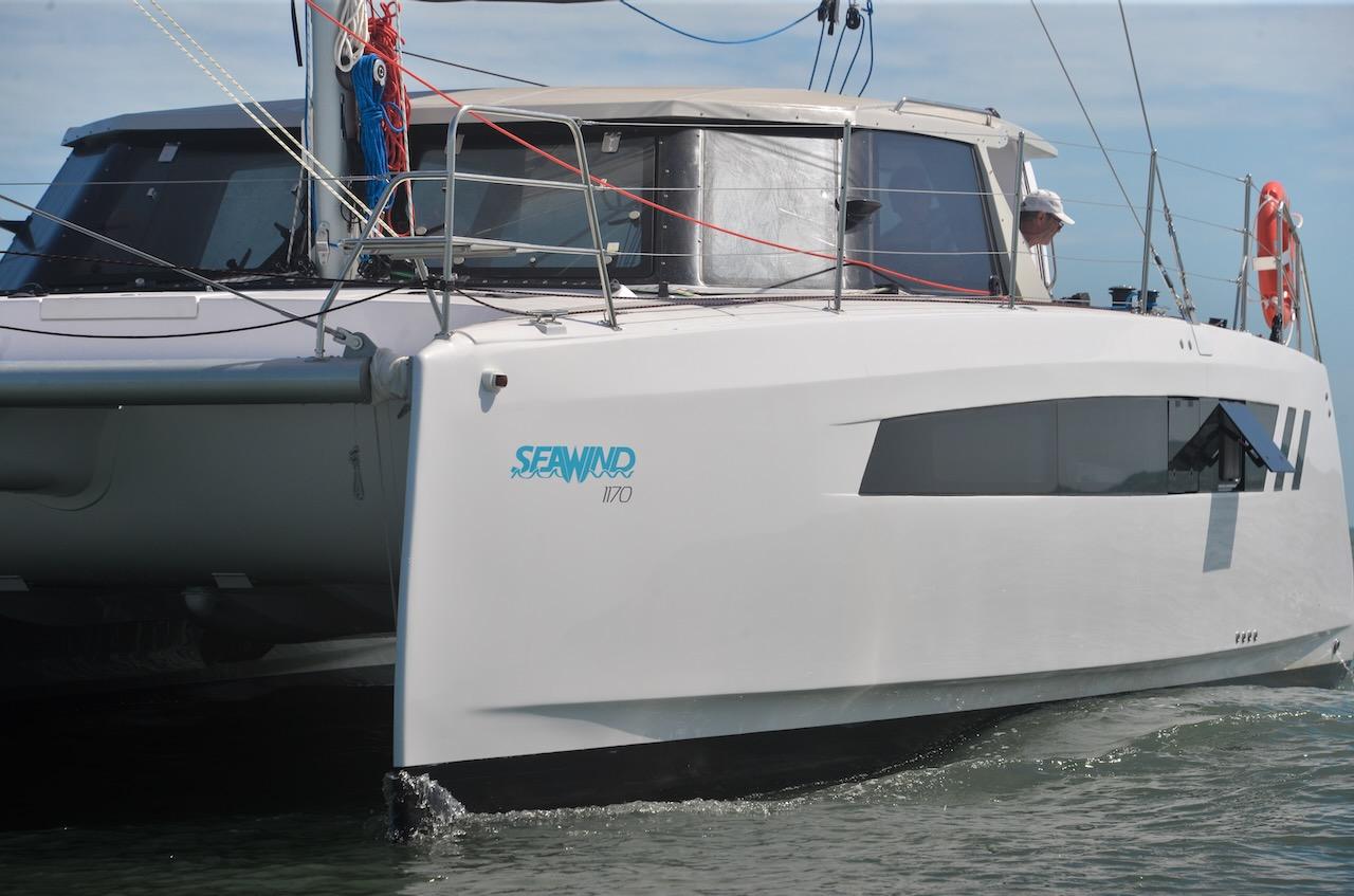2025 Seawind 1170 catamaran sailing on calm waters.