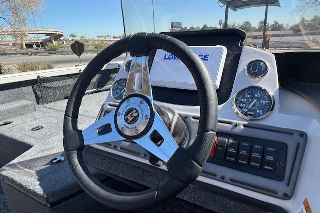 2026 Ranger VS1882SC Reata boat dashboard with steering wheel and gauges.