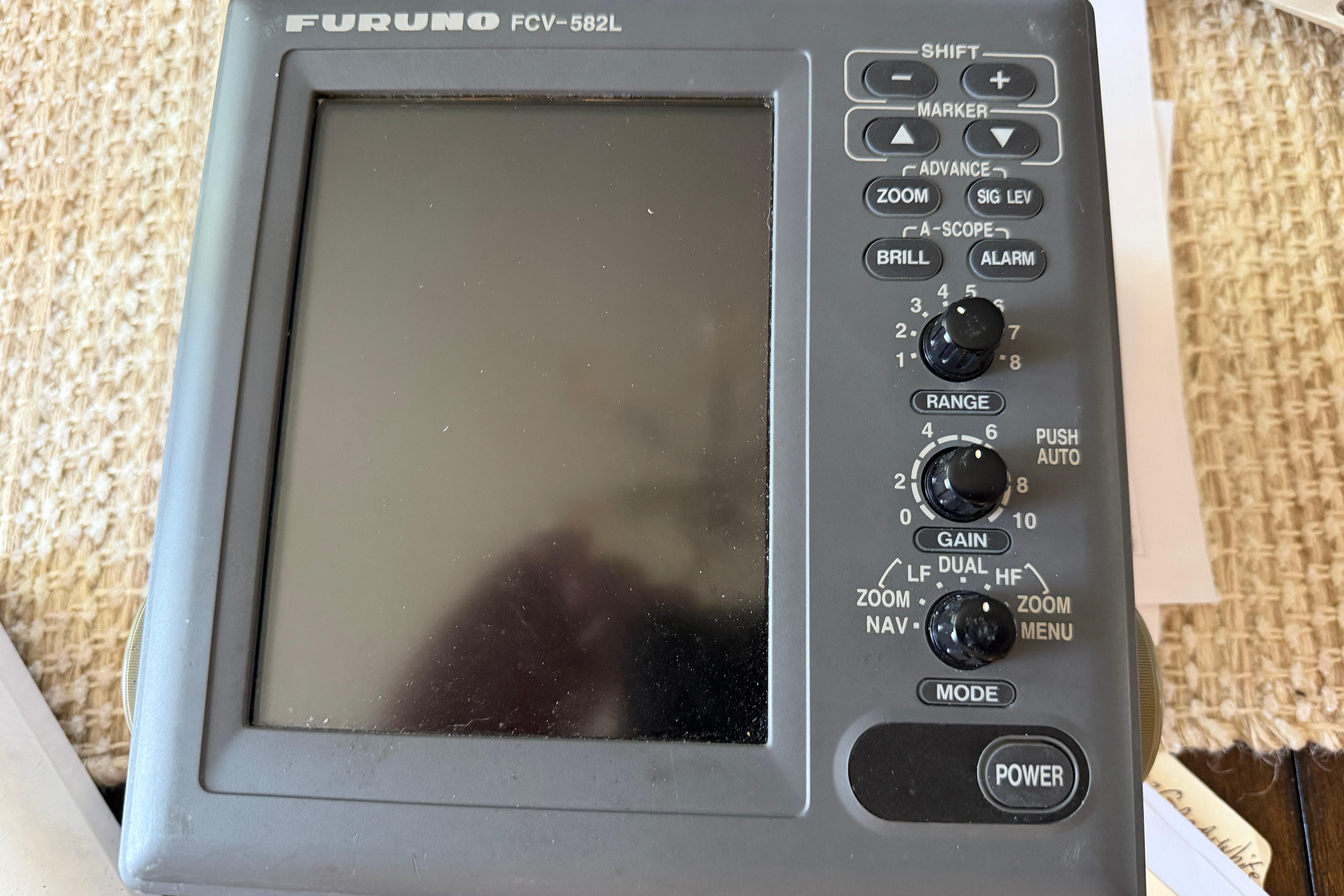 Furuno FCV-582L fish finder on 1987 Grady-White Seafarer 22 boat dashboard.