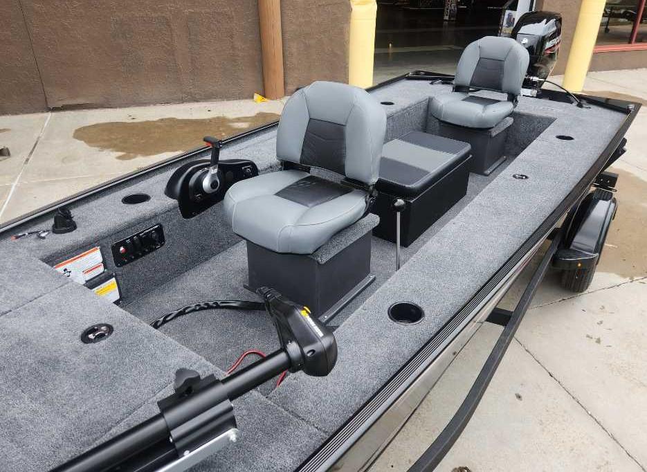 2025 Tracker Panfish 17 boat with gray seating and modern controls.