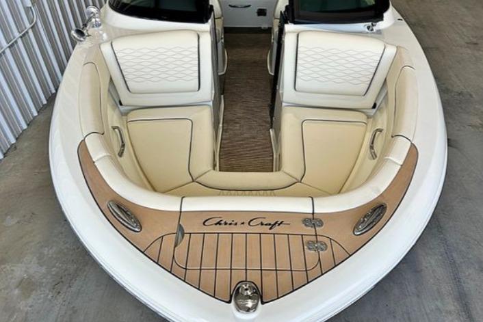 2025 Chris-Craft Sportster 25 boat interior with luxurious seating and elegant design.