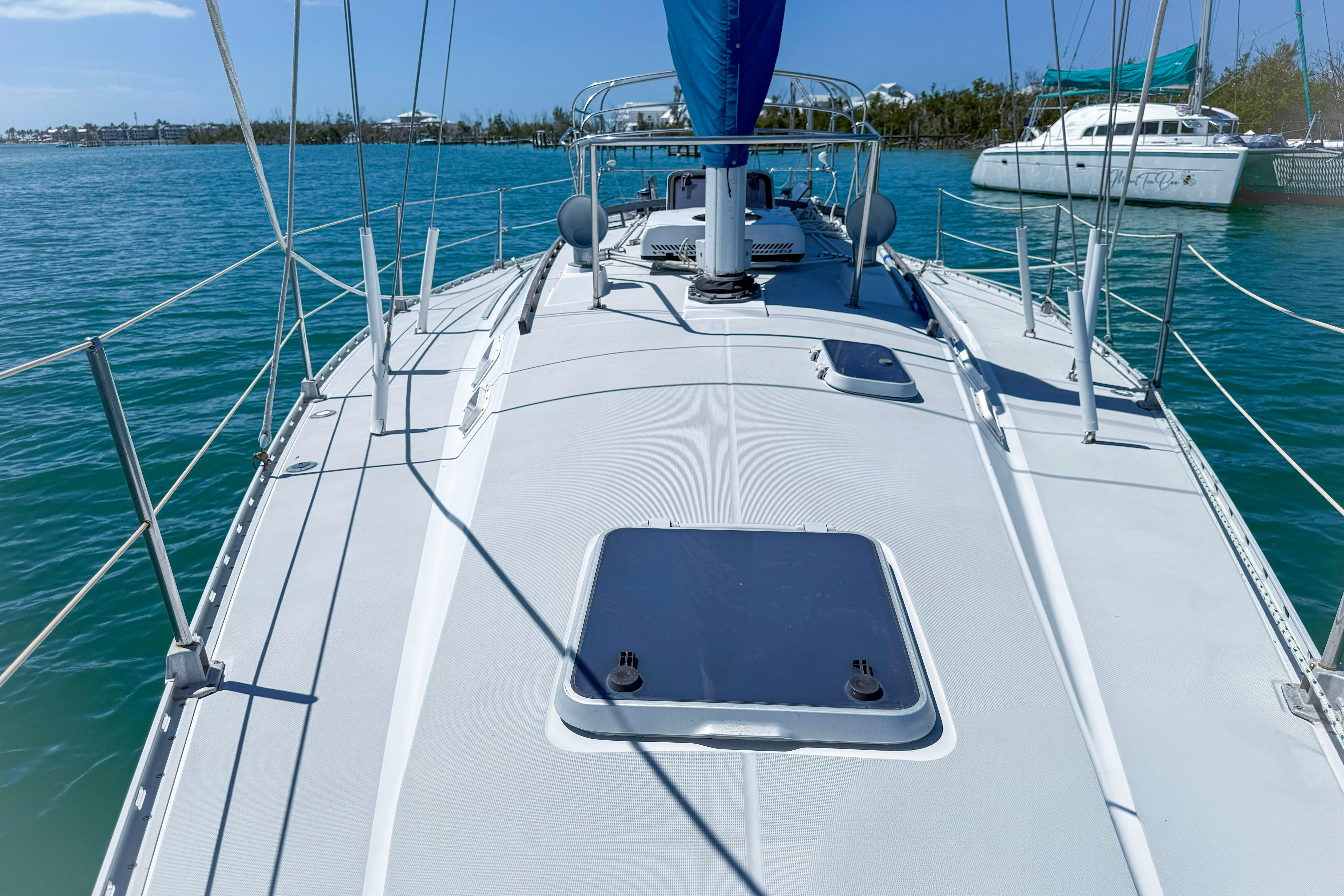 1988 Oday 40 sailboat deck view on calm blue water.