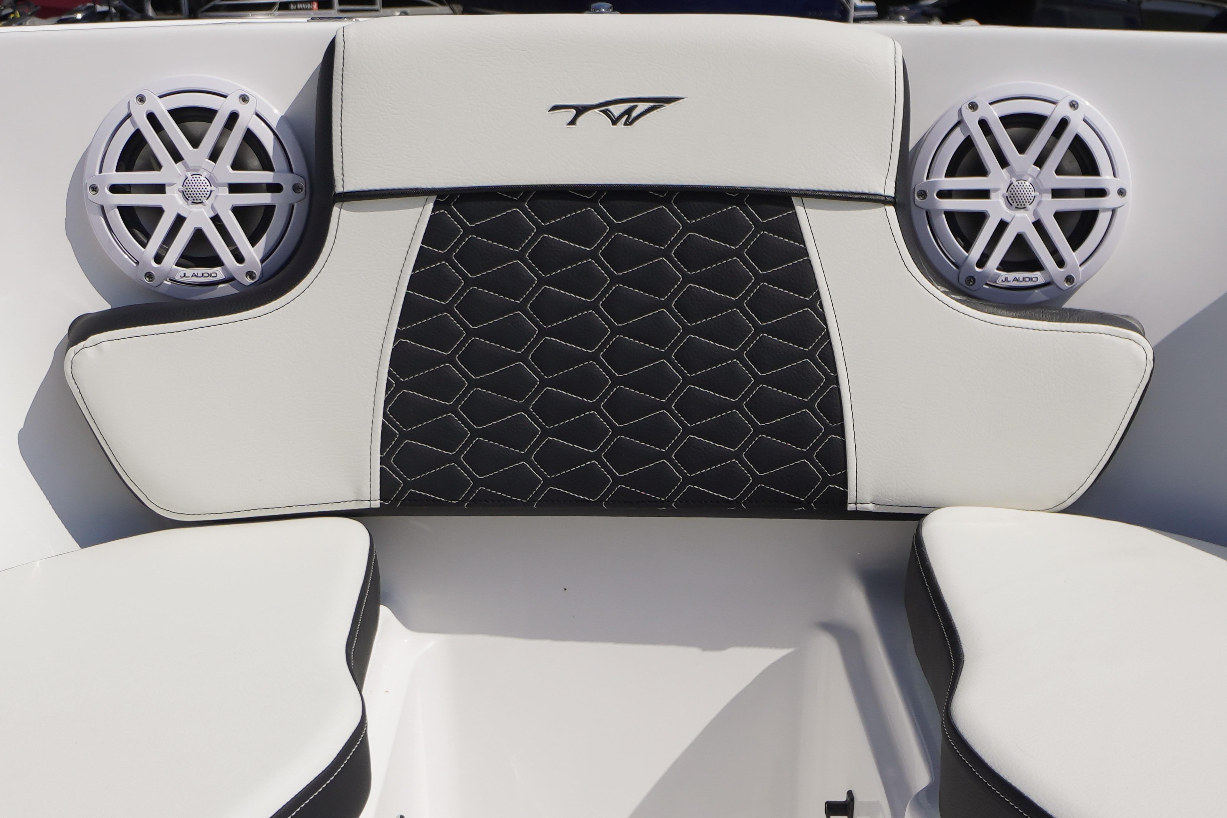 2026 Tidewater 220 CC Adventure boat interior with stylish seating and JL Audio speakers.