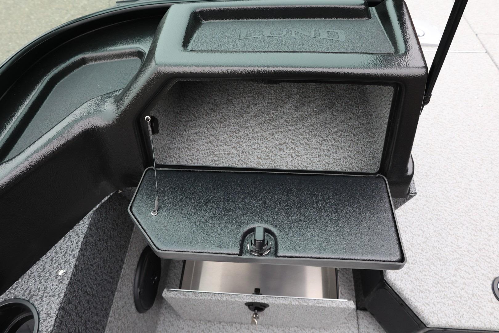 2026 Lund 1775 Impact XS Sport boat interior storage compartment.