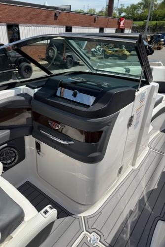 2023 Chaparral 267 SSX boat interior with sleek dashboard and seating.