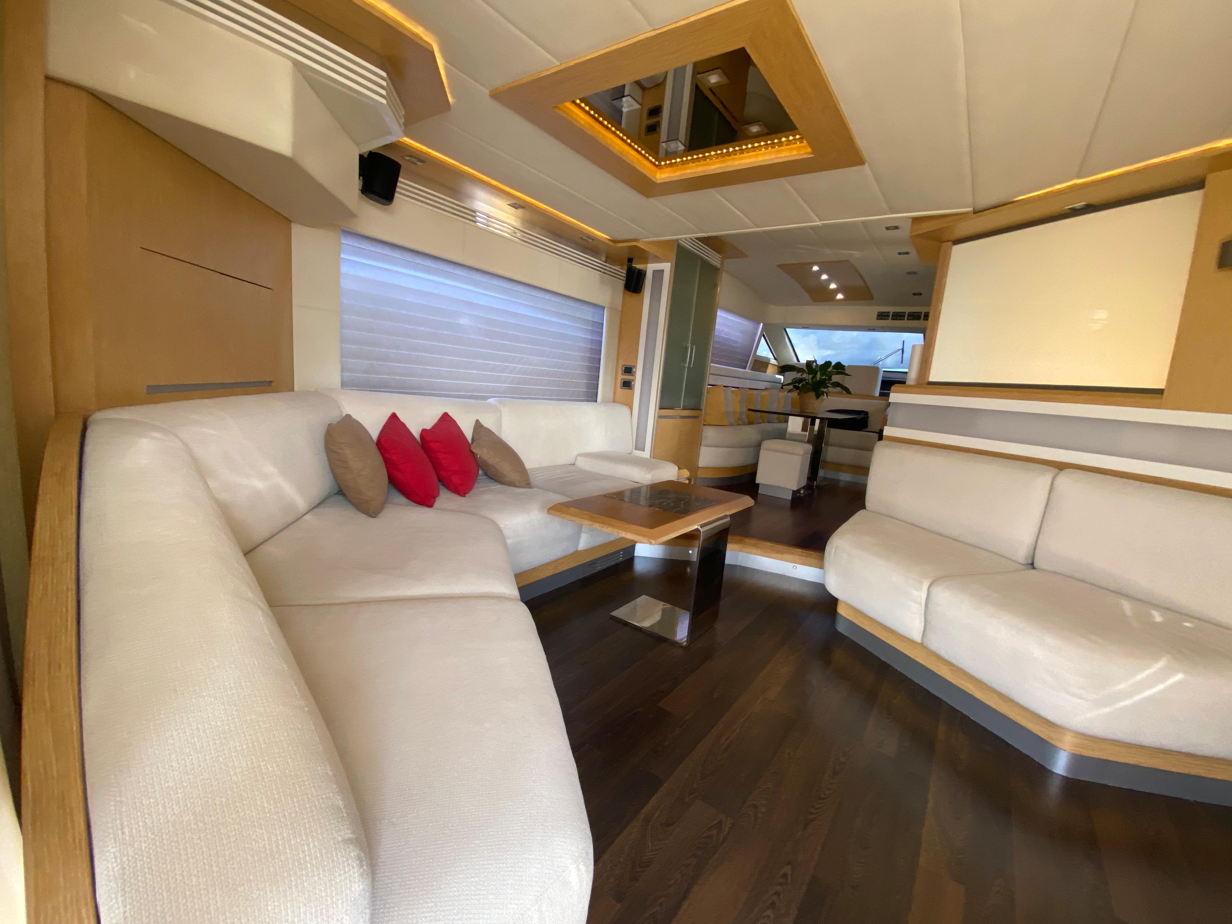 Luxurious interior of 2008 Dominator 680 yacht with elegant seating and modern design.