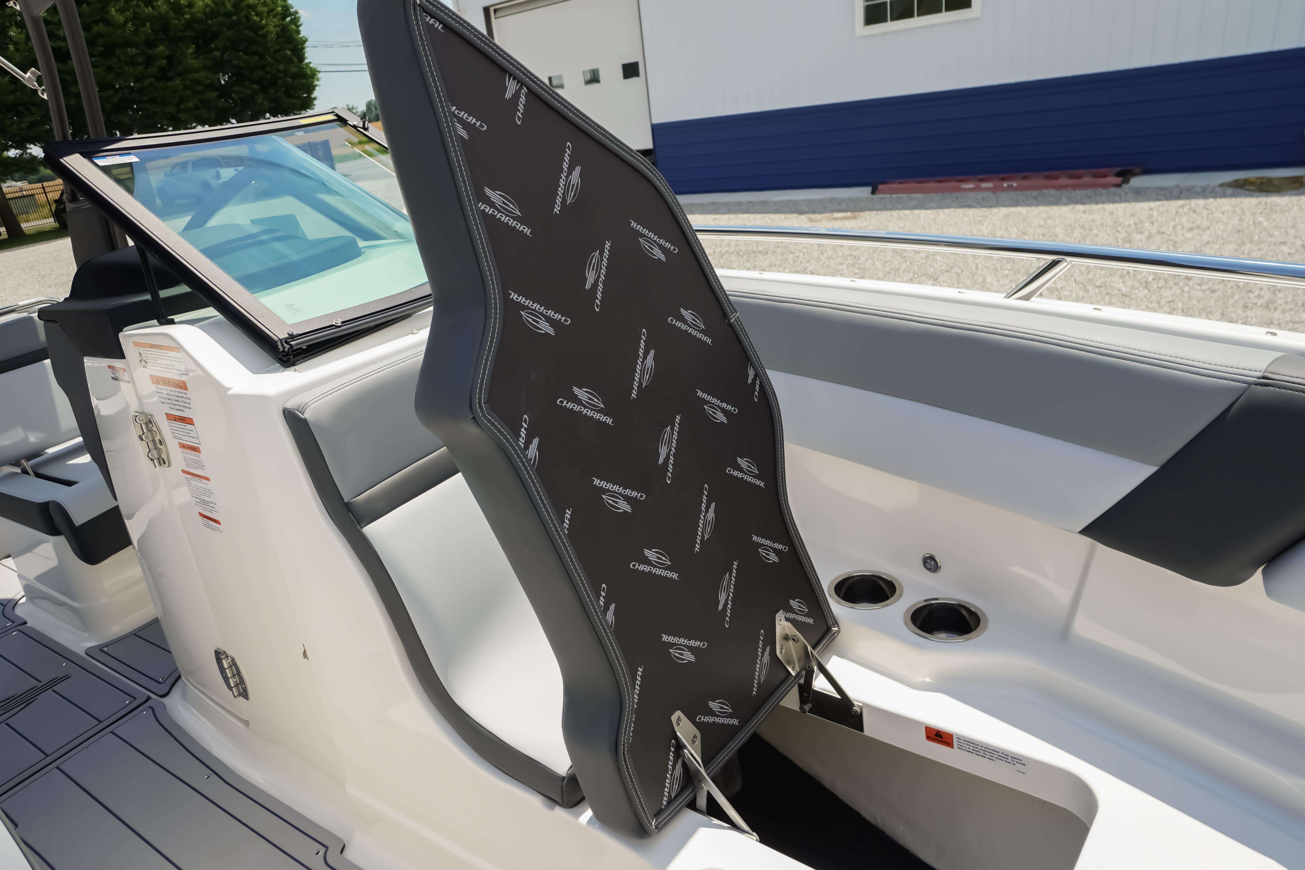 2026 Chaparral SSX 4 boat interior with adjustable seating and cup holders.