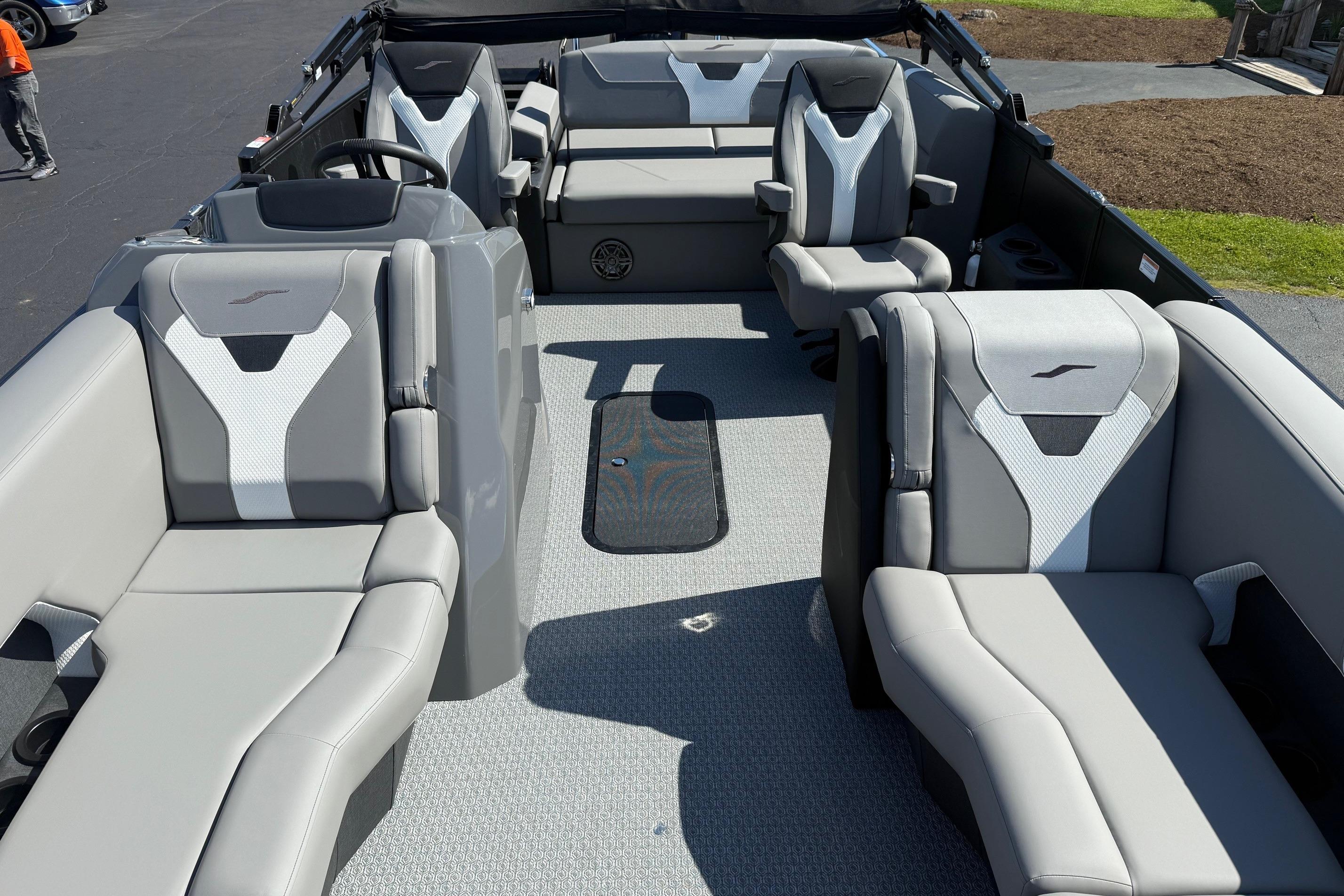 Luxurious interior of 2026 Evotti 521CS boat with modern seating and sleek design.