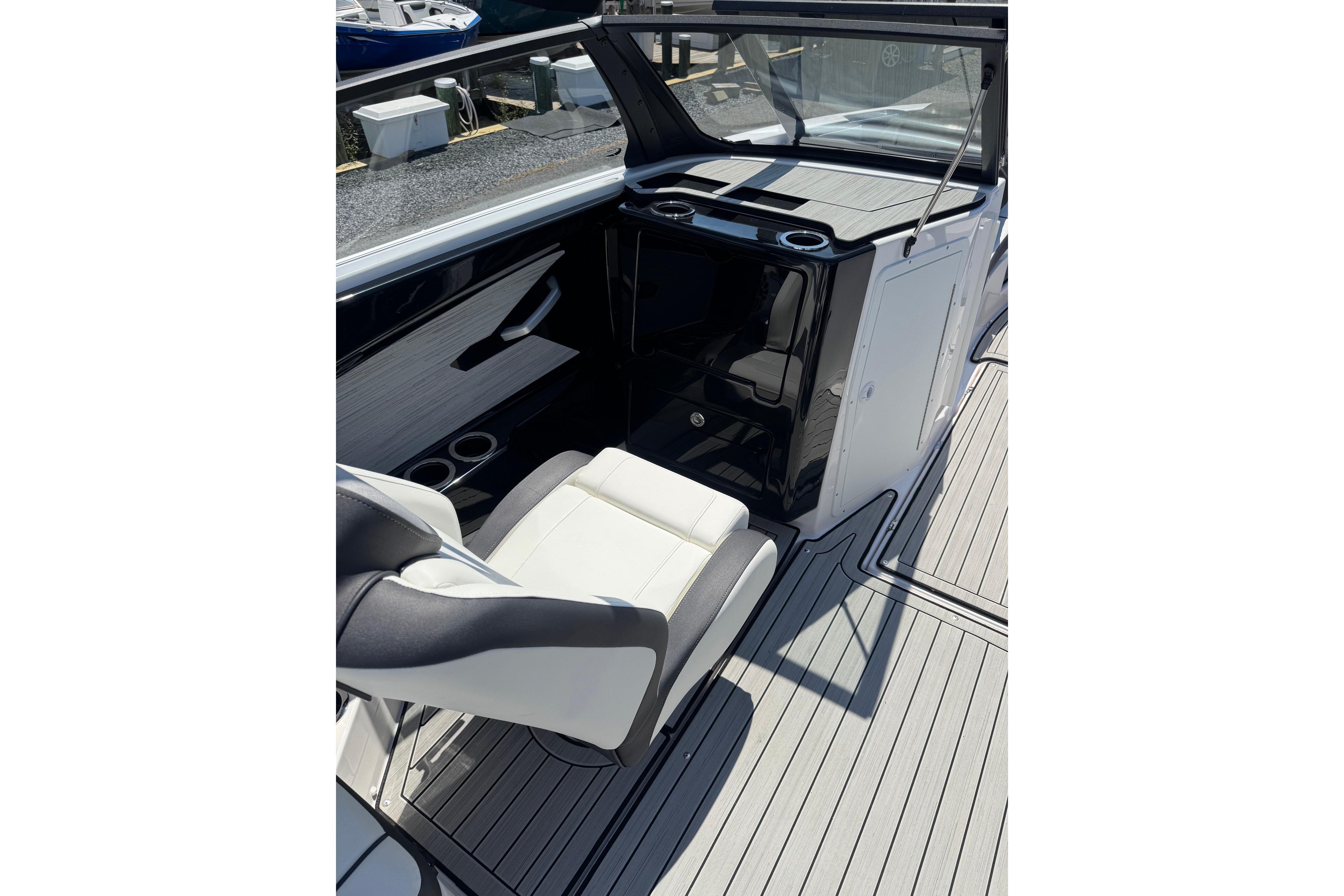 2023 Yamaha Boats 222SD interior with sleek seating and modern dashboard design.