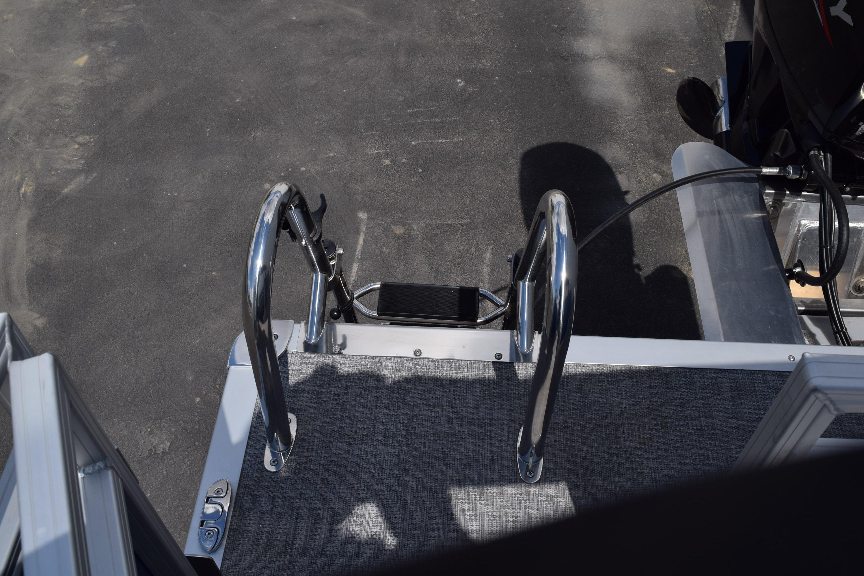 2026 Sun Tracker Party Barge 22 RF DLX boat ladder and deck detail.