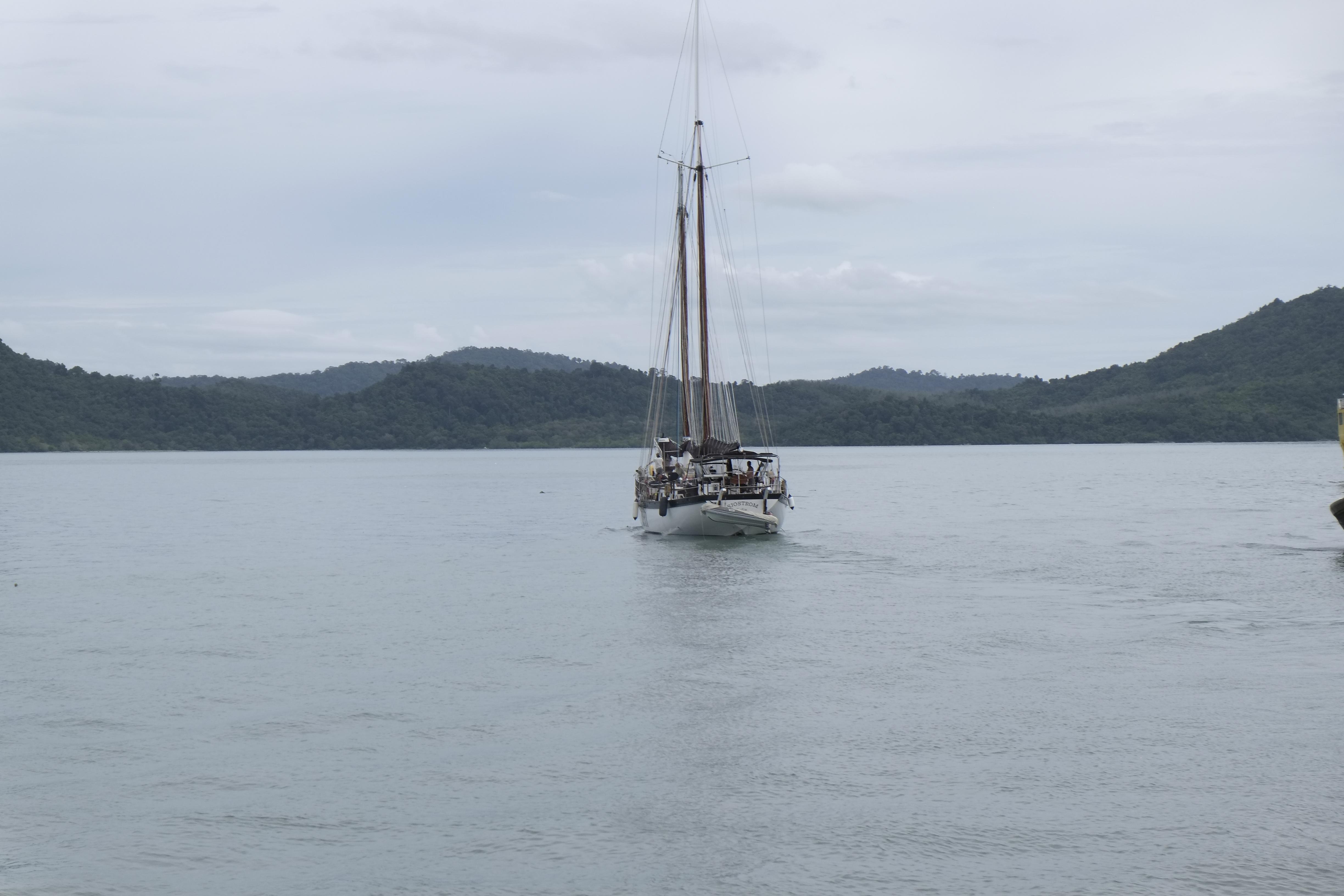 Schooner "Bud Macintosh" sailing on calm waters with hills in the background, 2006.