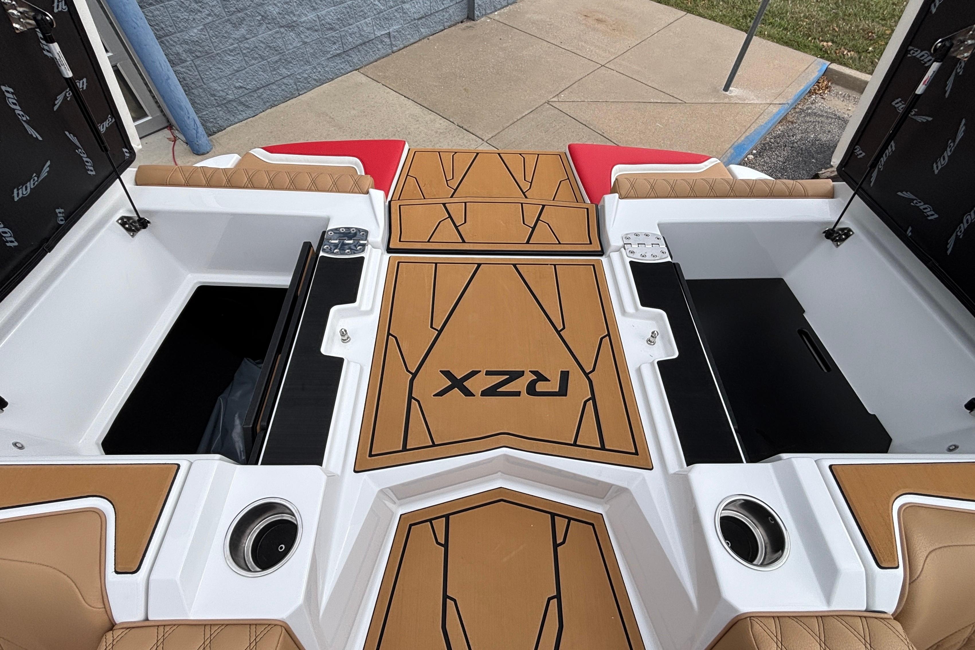 2026 Tigé 24RZX boat interior with storage compartments and stylish seating.