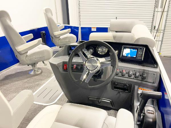 Interior of 2025 Bennington 20S boat with modern dashboard and comfortable seating.