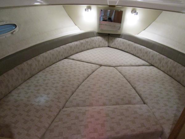 2025 Cutwater C-248 Coupe interior cabin with cushioned seating and ambient lighting.