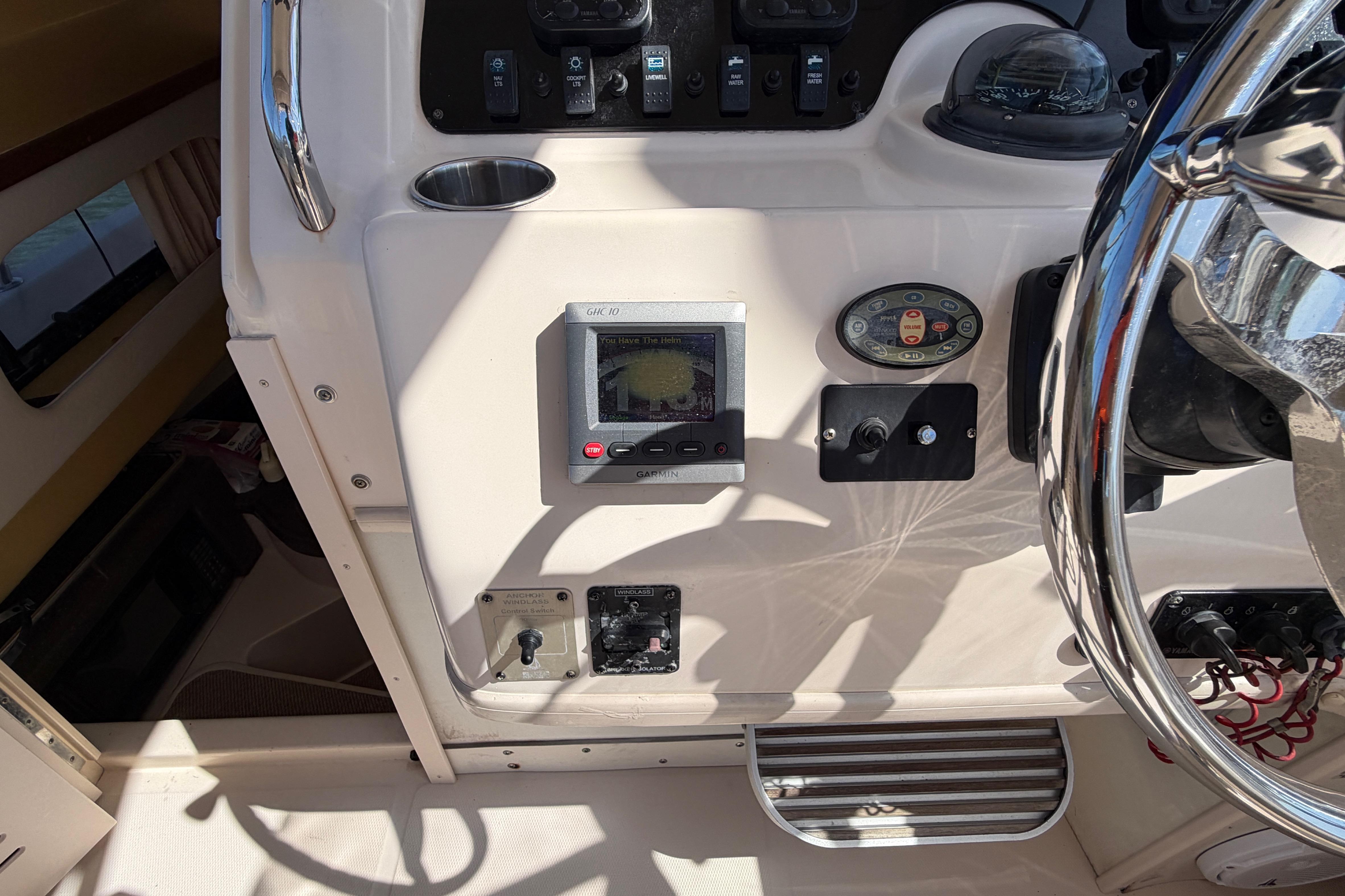 2006 Grady-White Sailfish 282 boat dashboard with steering wheel and navigation controls.
