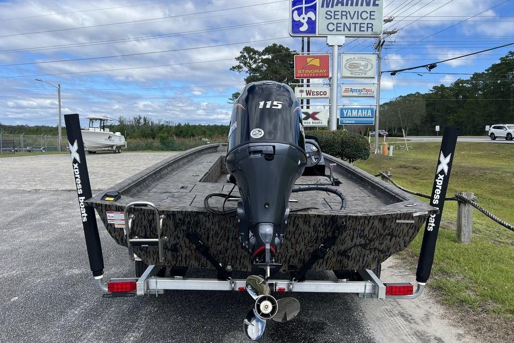 2026 Xpress XP200 boat with Yamaha motor at marine service center.