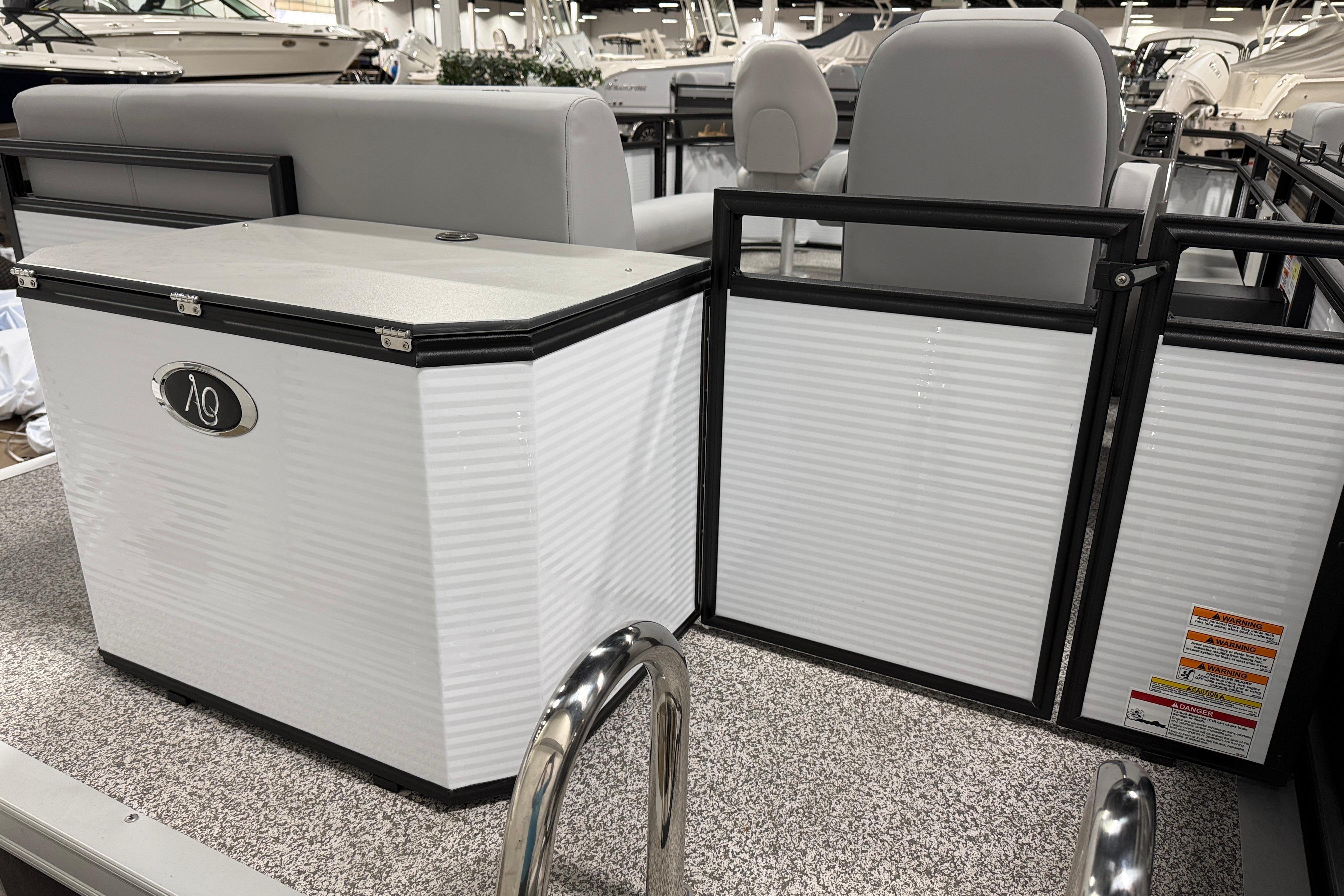 2026 Angler Quest 816 Panfish boat interior with seating and storage.