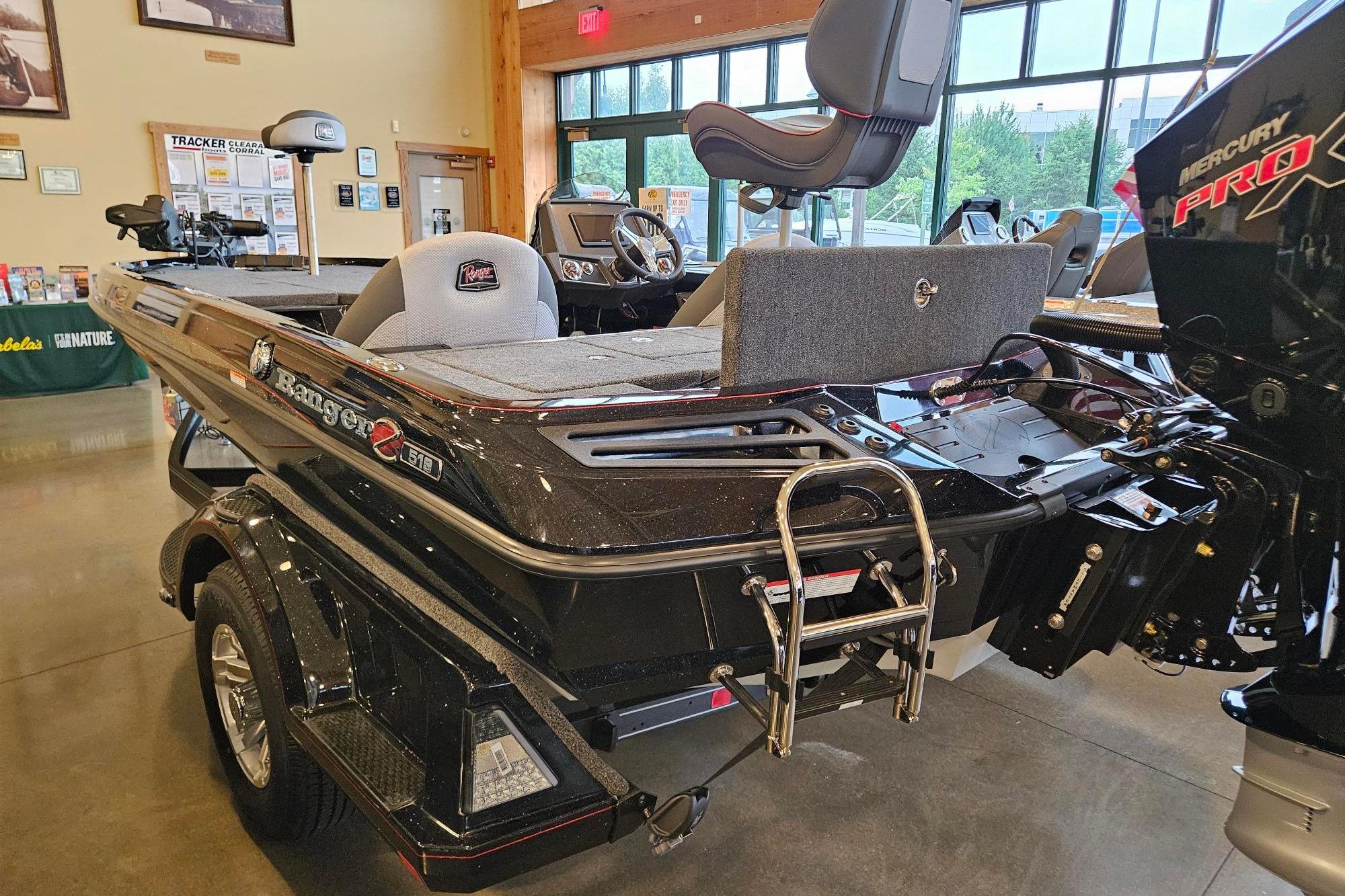 2026 Ranger Z518 Cup-Equipped boat displayed indoors, featuring sleek design and modern equipment.
