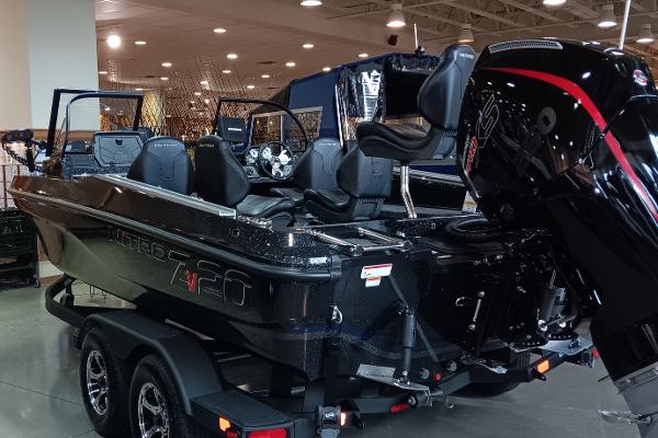 2025 Nitro ZV20 boat with powerful engine on display in showroom.