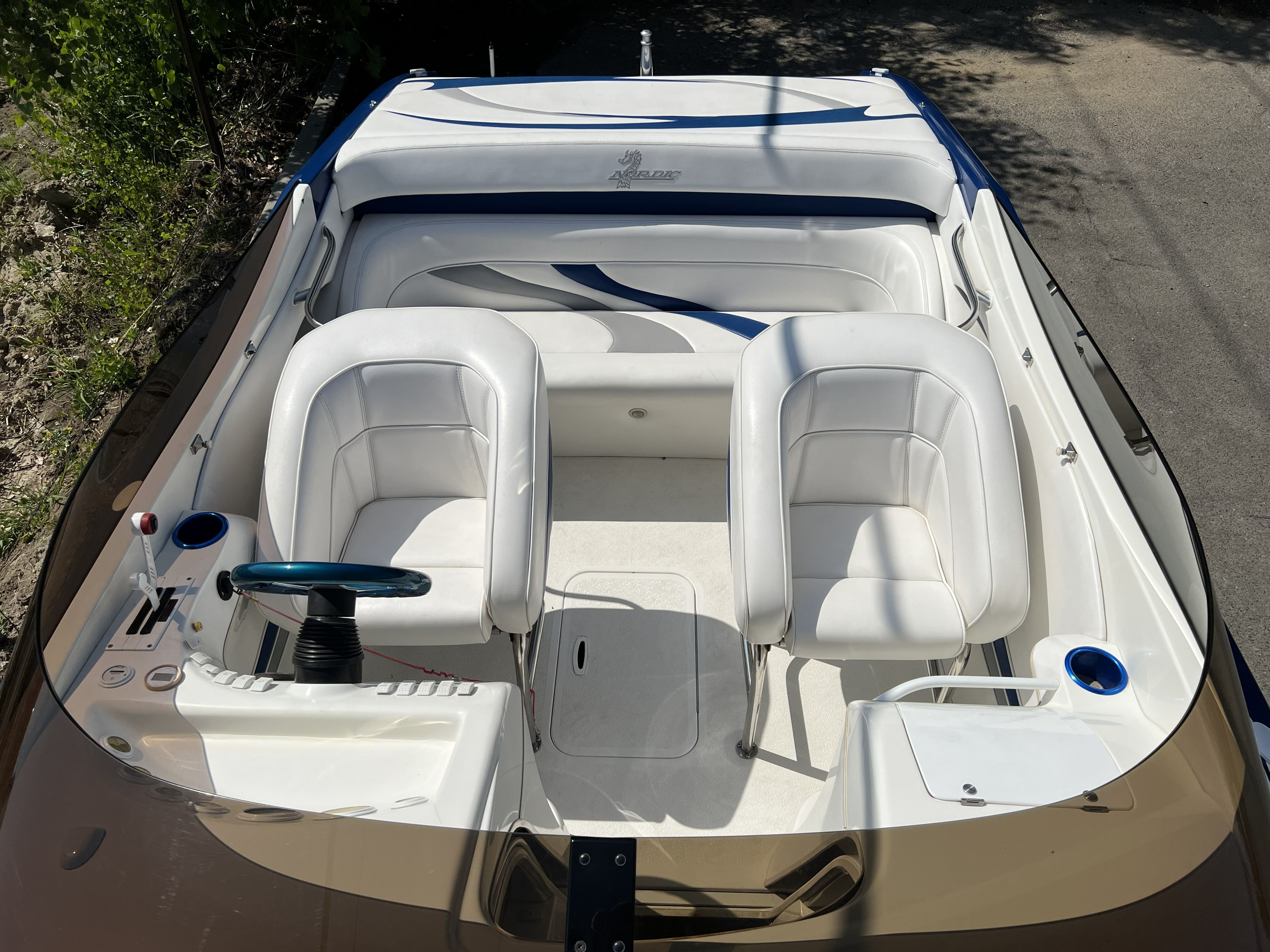 Interior of a 2007 Nordic Powerboats Heat with white seating.