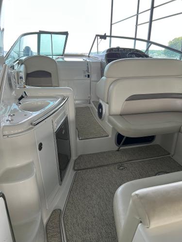 Interior of a 2008 Chaparral Signature 310 boat with seating area.