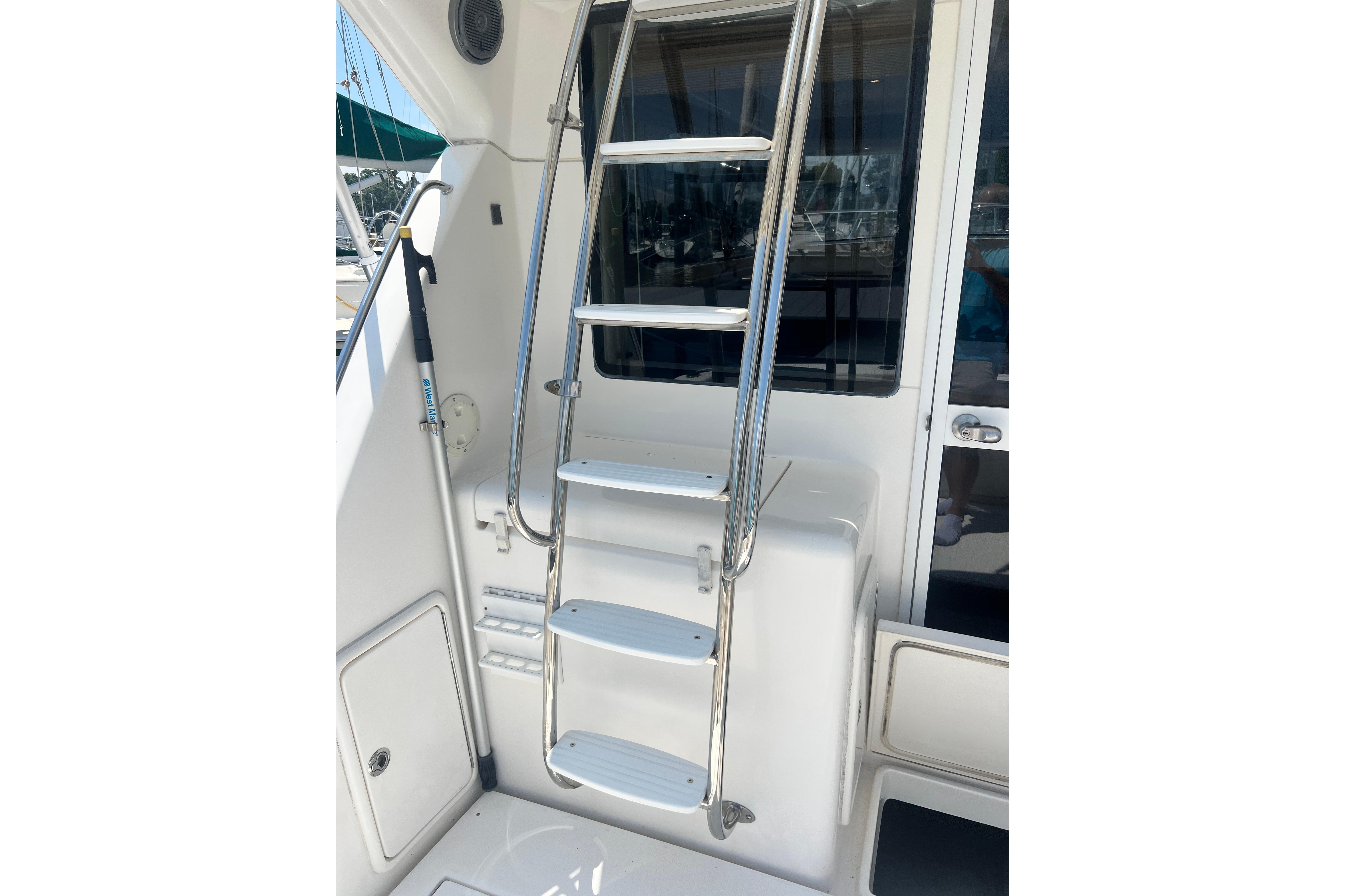 Stainless steel ladder on 2007 Riviera 33 Flybridge yacht.