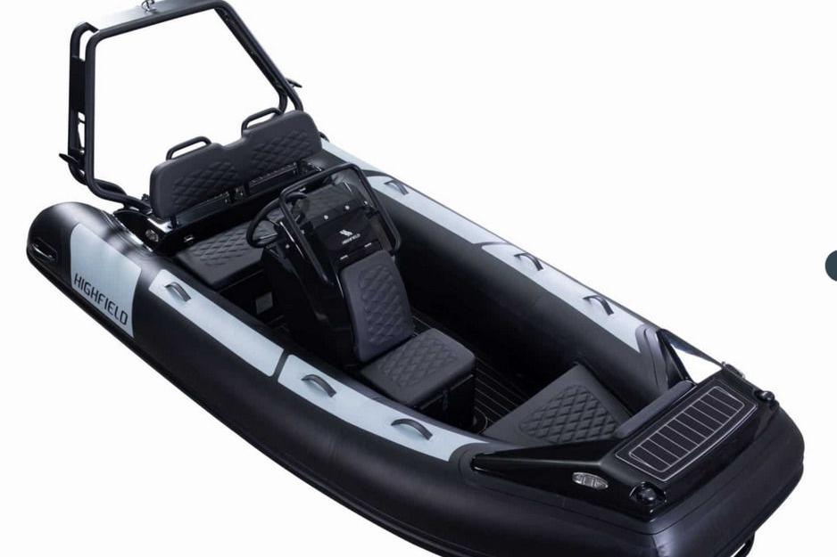 2025 Highfield Sport390 inflatable boat with sleek black design and modern seating.