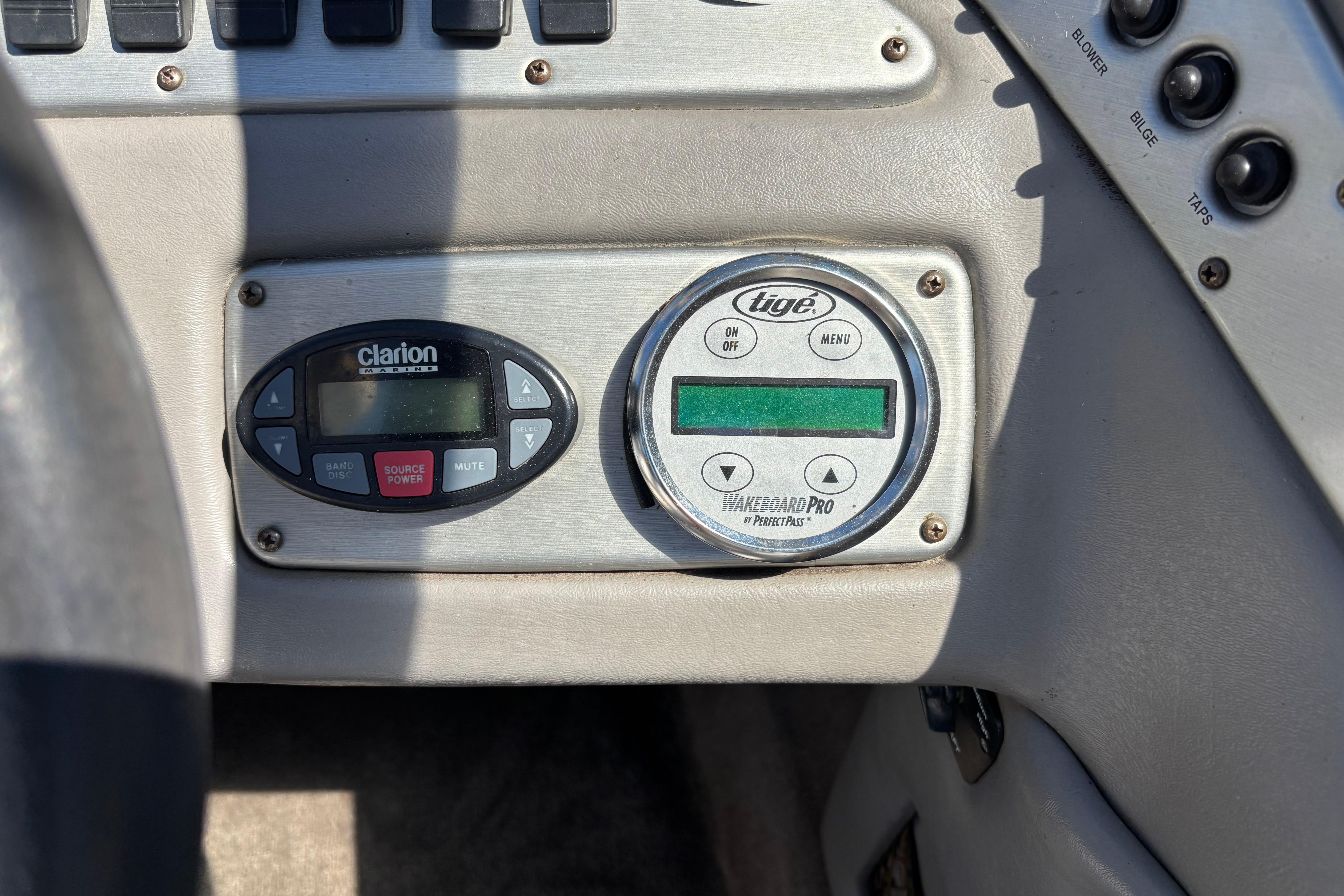 Dashboard controls of a 2004 Tigé 22V Limited Edition boat.