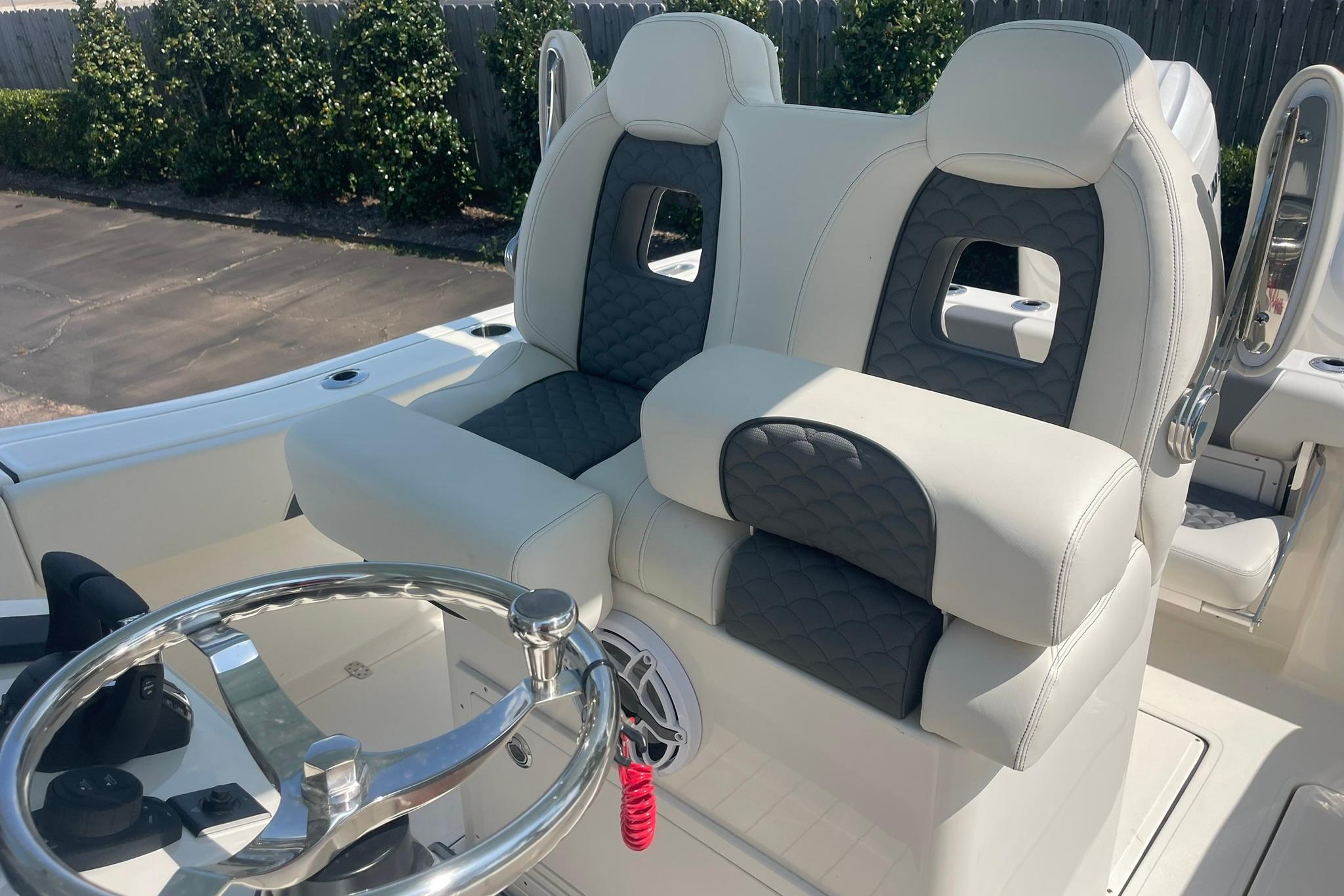 Luxury seating on 2026 Pioneer 250 Pelagic boat, featuring modern design and comfort.