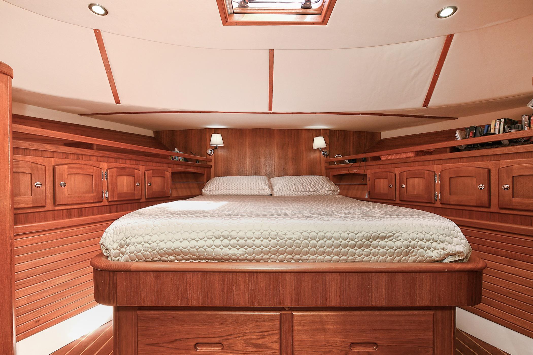 Luxurious wooden cabin interior of 2005 San Juan Downeast Express yacht.