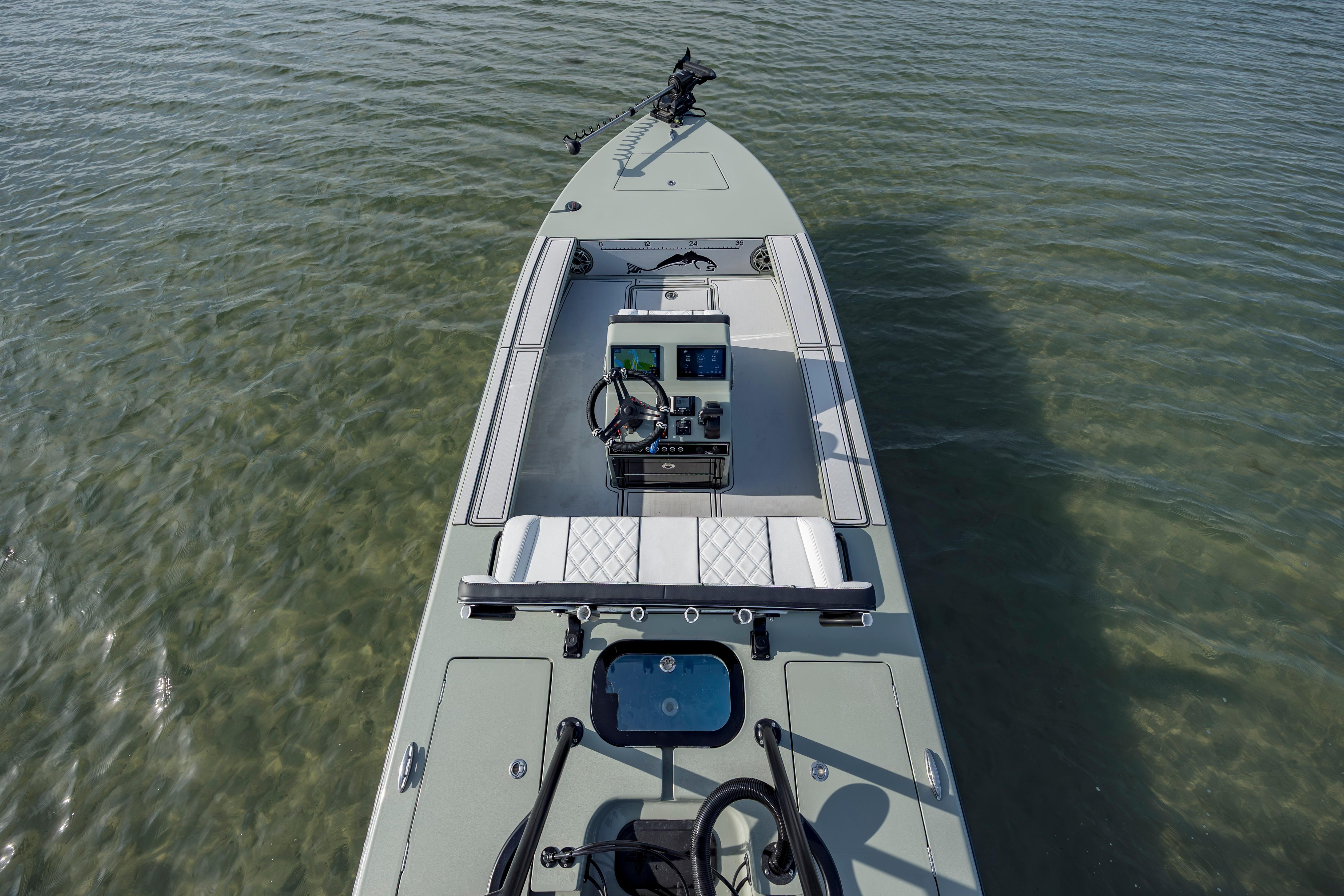 Modern Vtech 18 boat, 2025 model, on clear water, featuring advanced navigation controls.