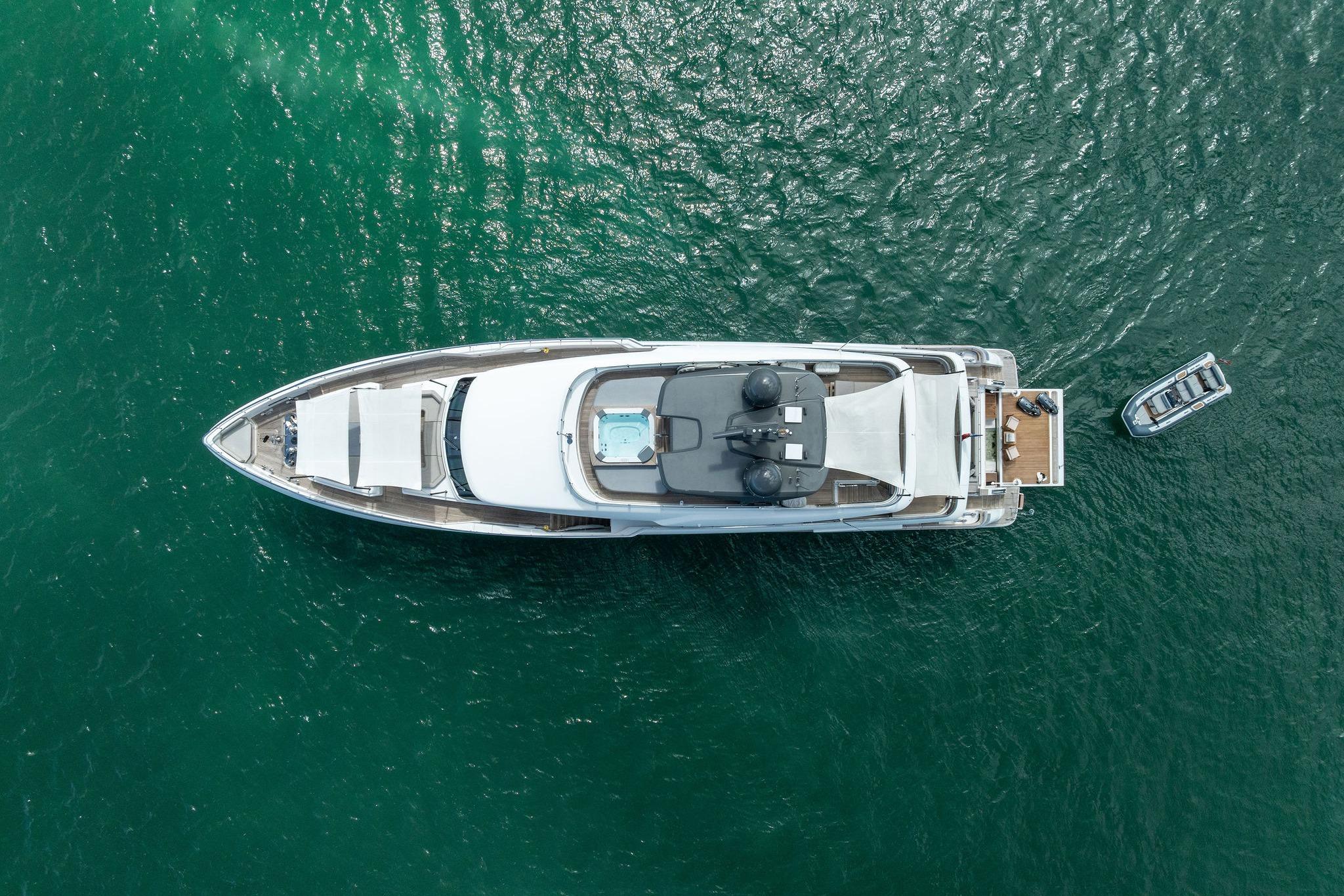 Aerial view of 2023 Custom Line Navetta 33 yacht on open water.