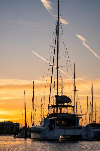 Sailing yacht Bali 4.8 at sunset in marina, 2021 model.