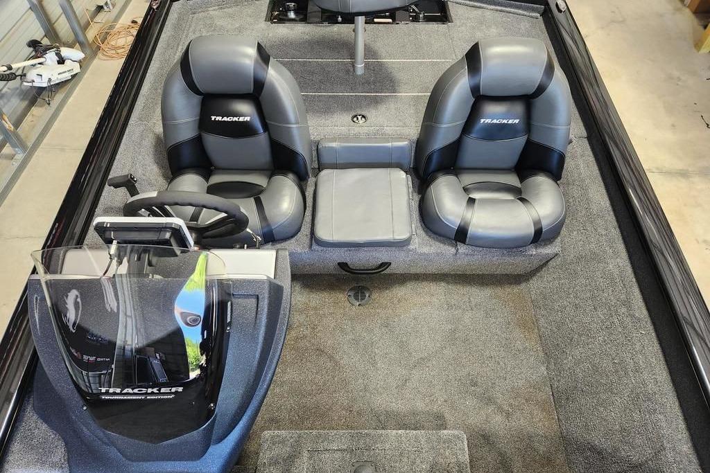 2026 Tracker Pro Team 175 boat interior with dual seats and steering console.